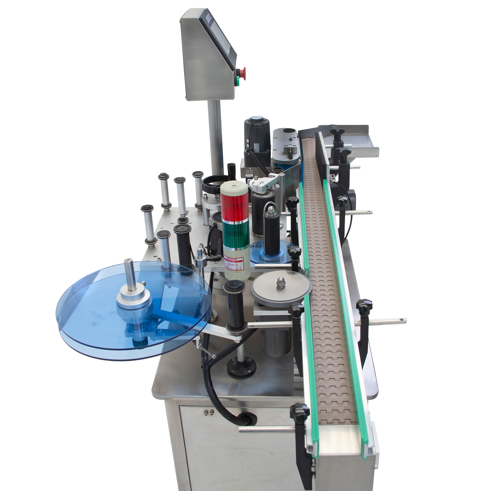 top view of stainless steel automatic label applicator for round containers with green guard rails and motorized conveyor belt