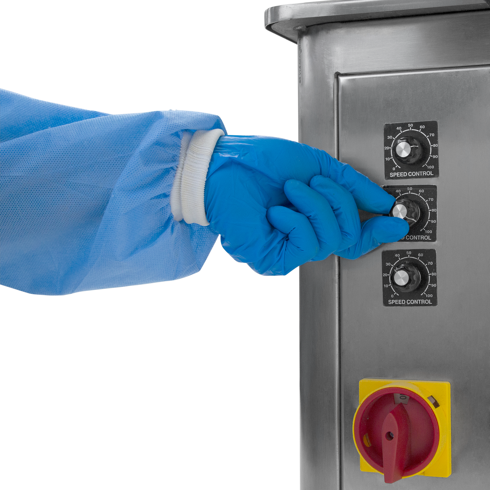 operator wearing blue gloves adjusting black speed knobs on stainless steel automatic label applicator