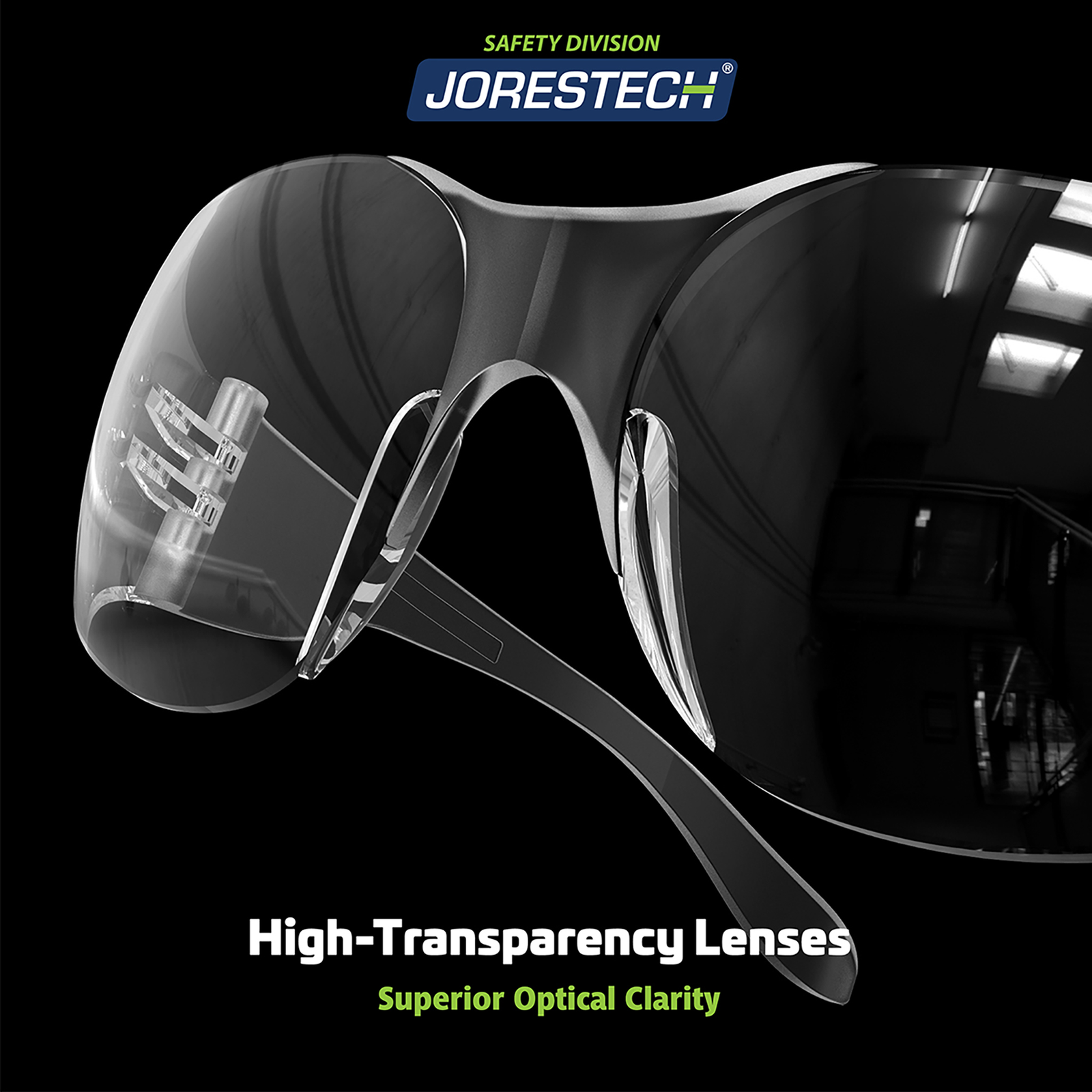 A close-up of one JORESTECH anti-fog clear safety glasses for high impact protection over black background. Bright green and white letters read: high transparency lenses for superior optical clarity
