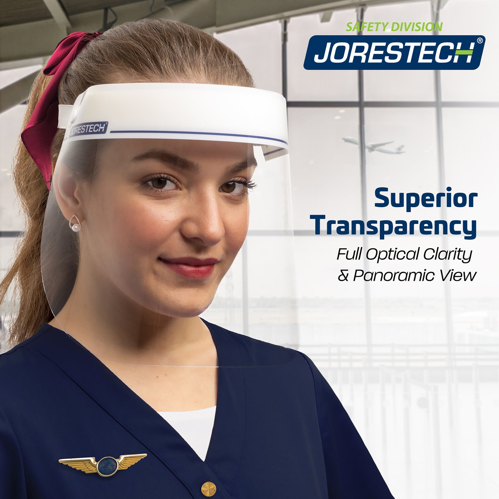 A young lady using a clear protective JORESTECH face shield with elastic headband in a setting of an airport