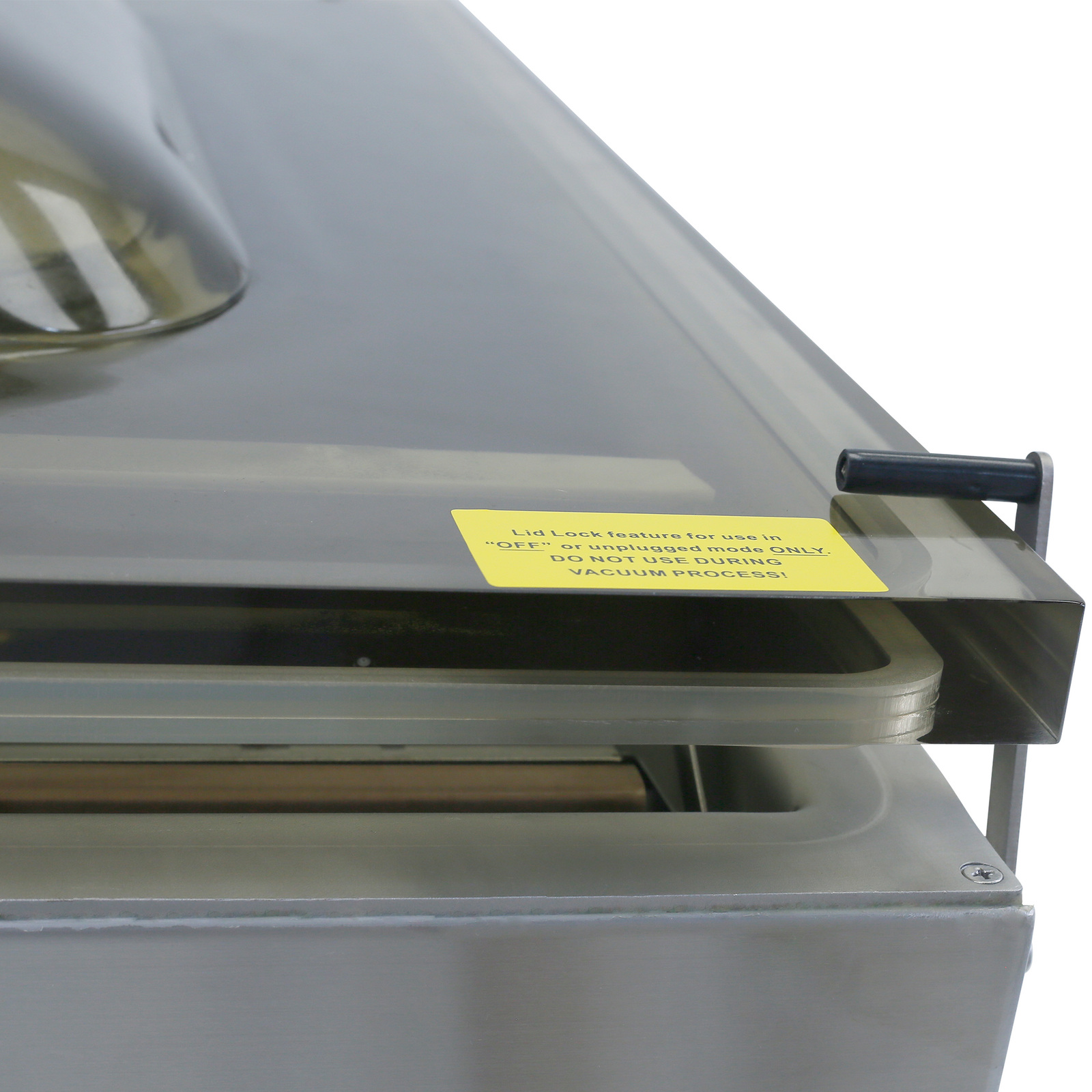 Close up of the bracket holding the lid of the JORES TECHNOLOGIES® vacuum sealer closed