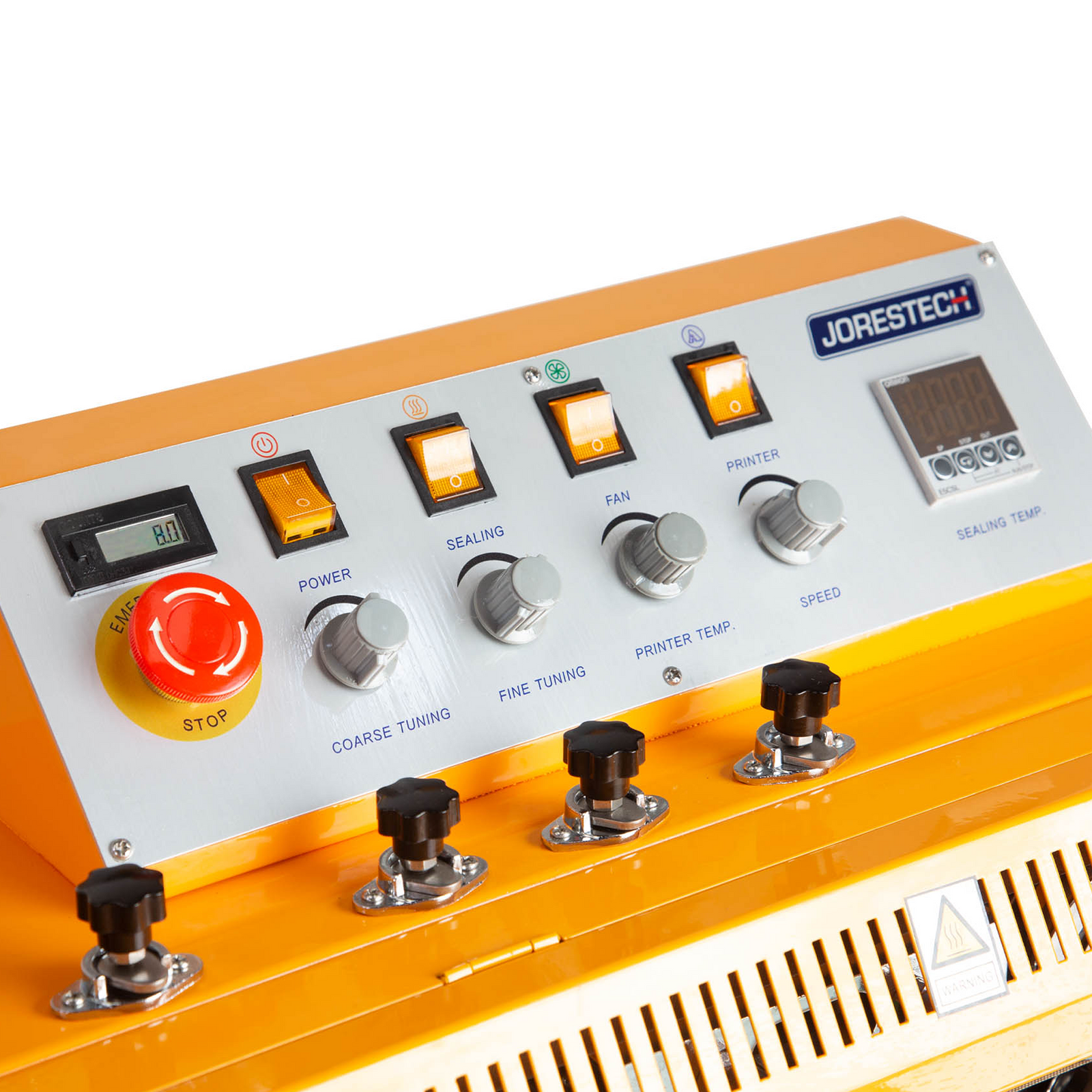 close up of the control panel on a yellow JORES TECHNOLOGIES® continuous band sealer with red emergency stop button and four yellow switches. and a digital sealing temperature regulator.