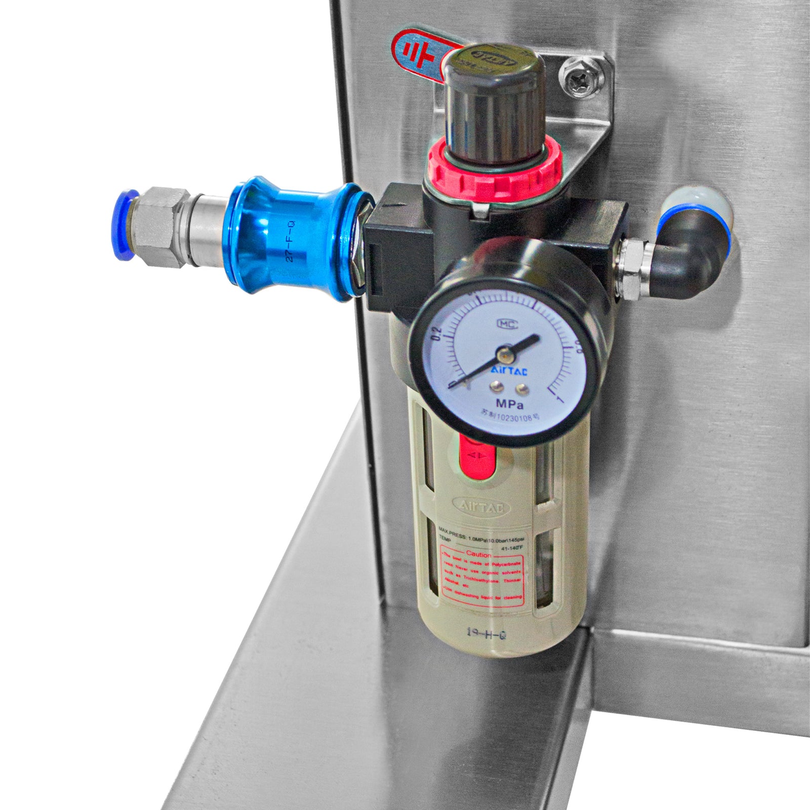 Closeup of the compressed air regulator of the high viscosity piston filler