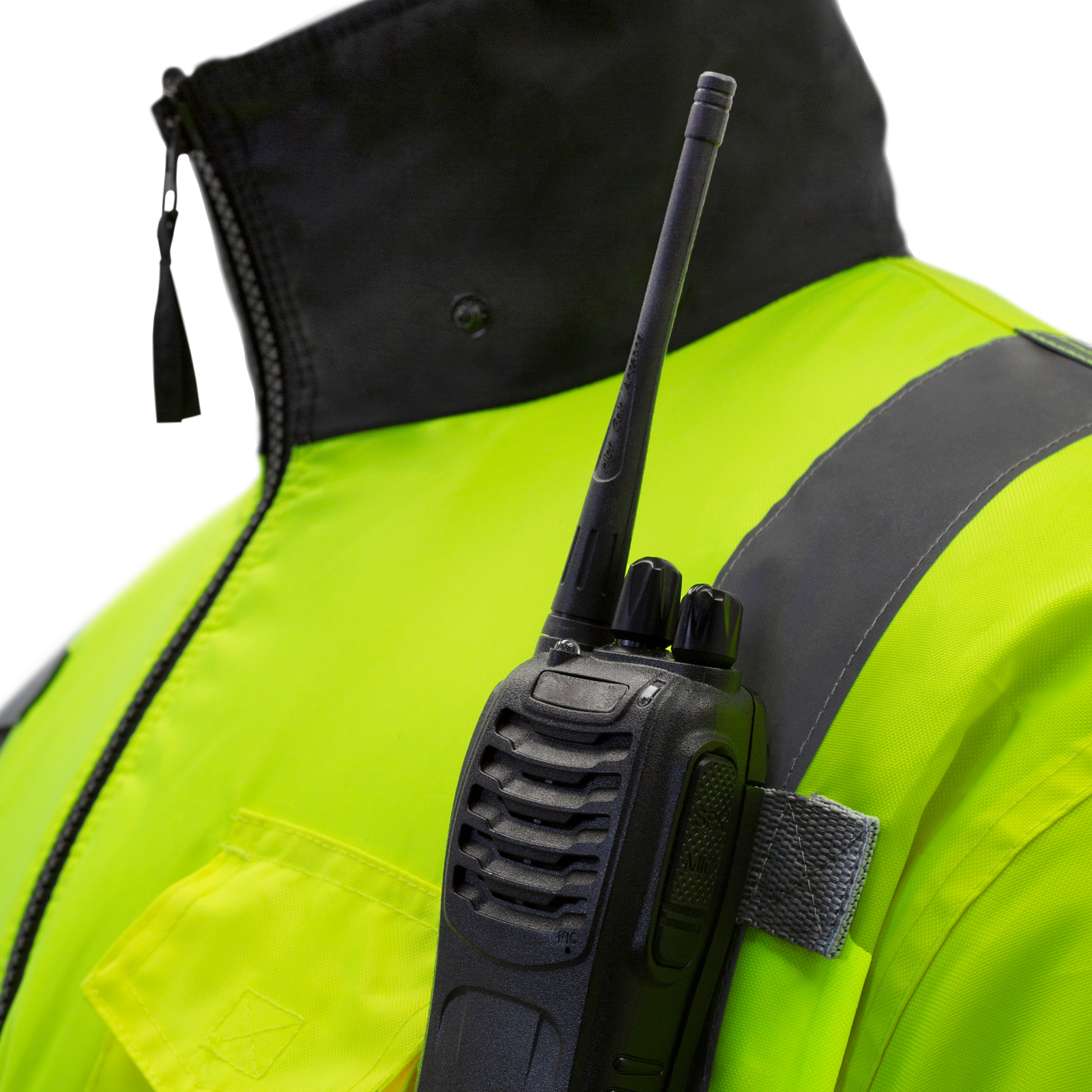 Close up shows a radio hooked to the radio tab of the JORESTECH Hi Vis safety bomber jacket with radio tabs