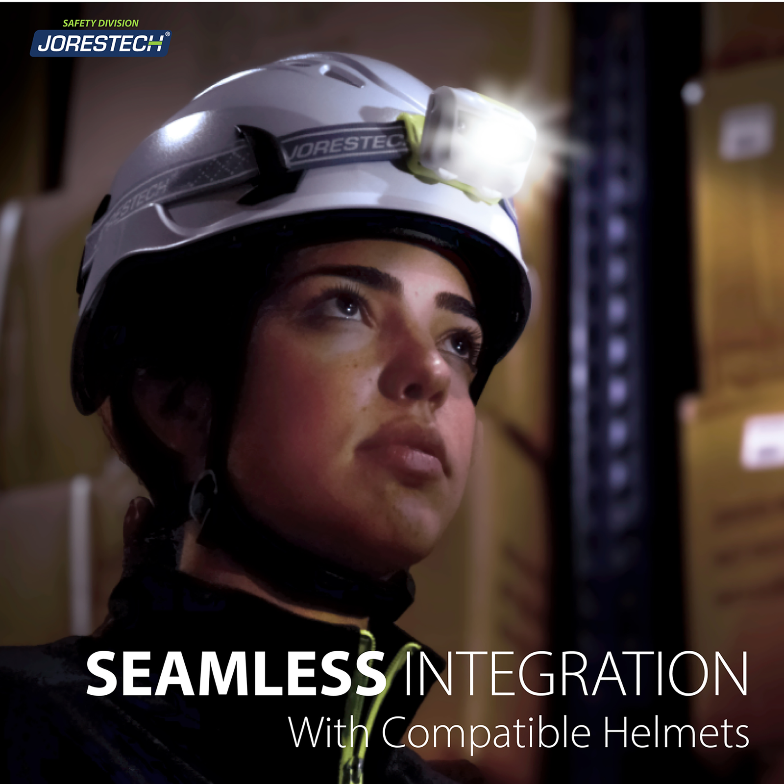 A woman wearing a white hard hat with a white head lamp installed. Text reads: seamless integration with compatible helmets. She is in a setting were the main light source is the head lamp.