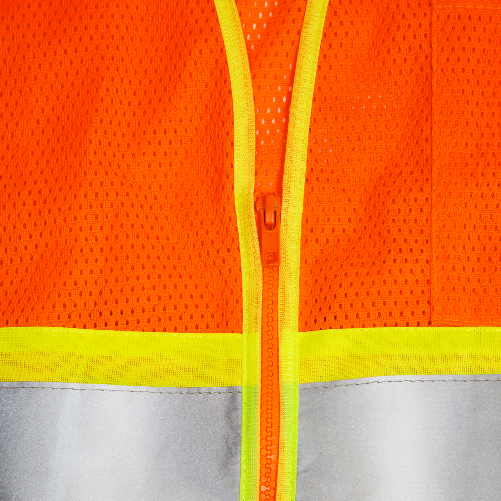 Close up of the zipper of the  orange and JORESTECH reflective vest