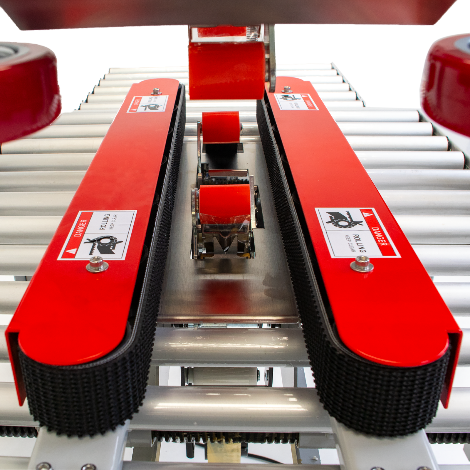 close up of red traction bars with black bands on white case sealer 