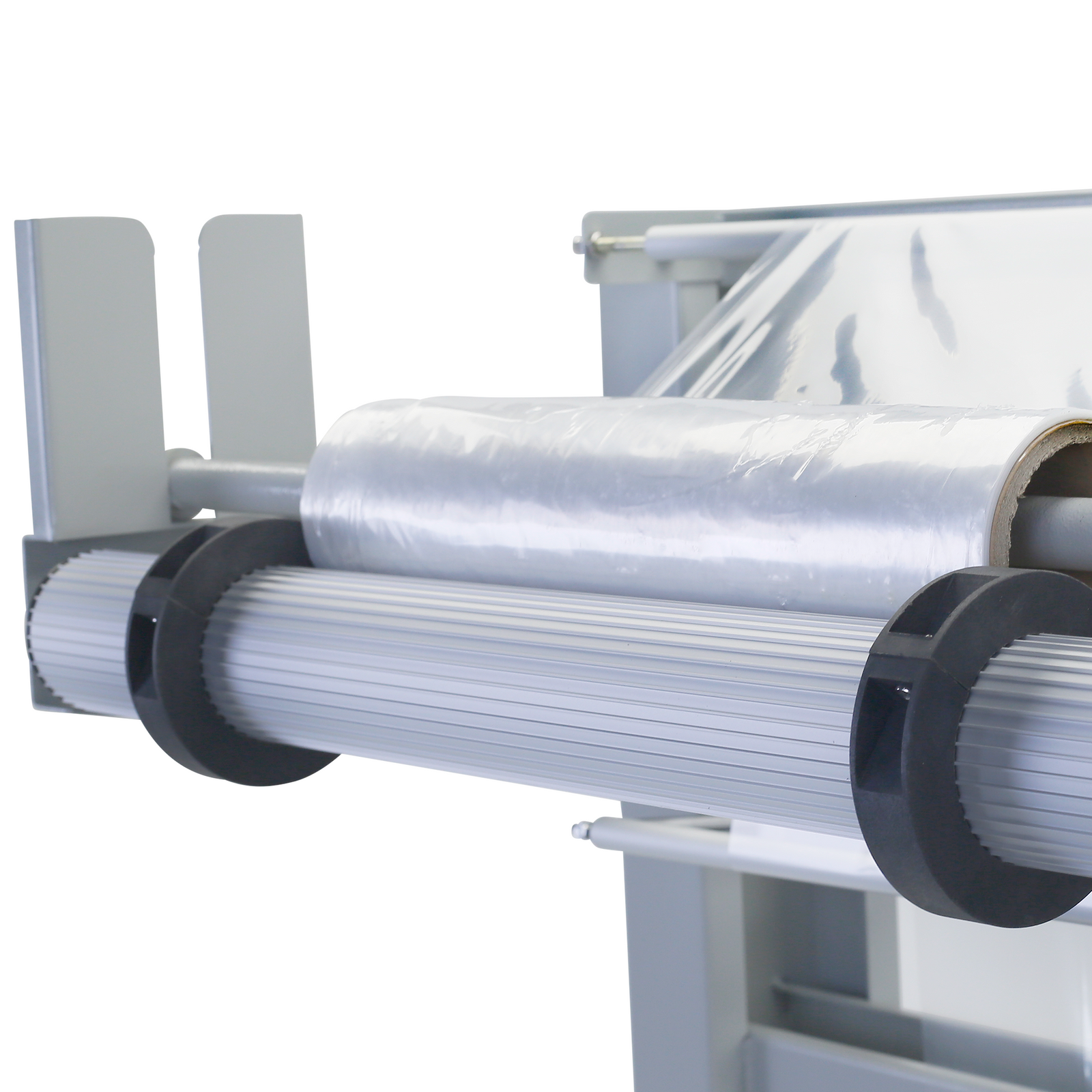 Close up view of the Shrink Film Roll positioned in the JORES TECHNOLOGIES® Sleeve Shrink Film Sealer