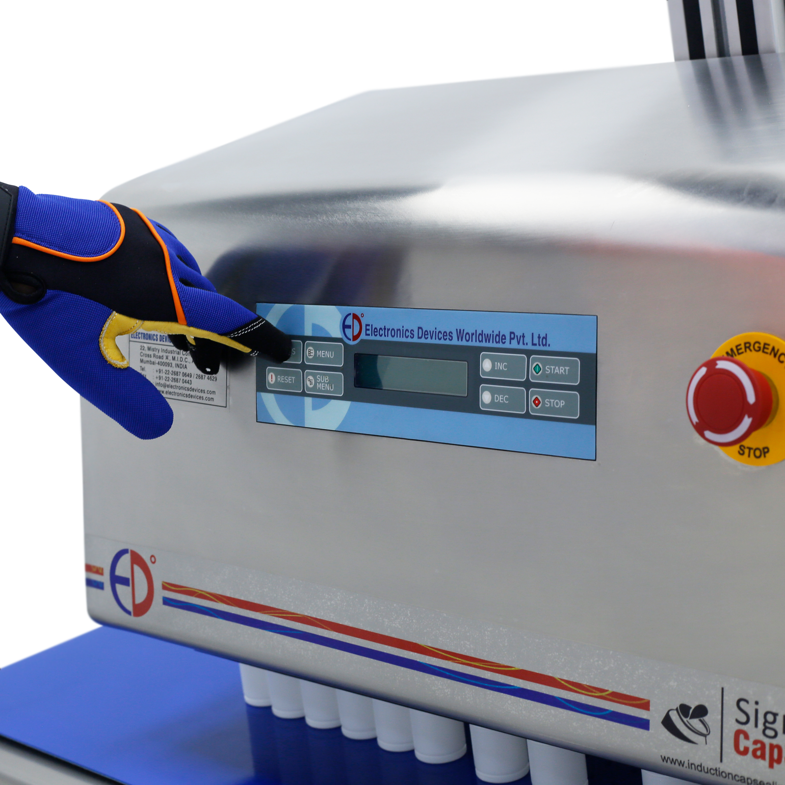 Operator wearing a blue glove can be seen pressing a button on the control panel of a SIGMA induction sealer machine.