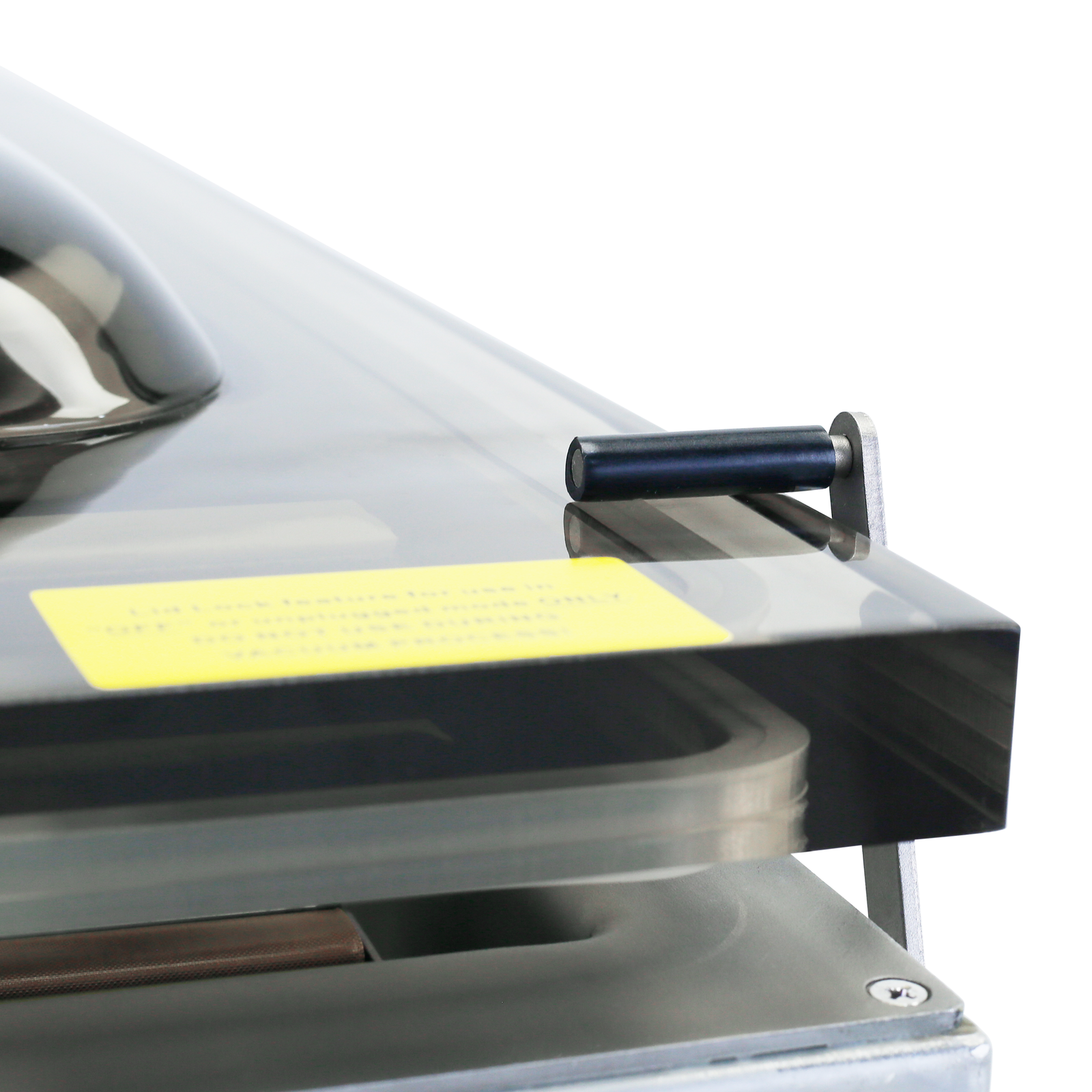 The lid of the JORES TECHNOLOGIES® single chamber vacuum sealer in a closed position. It also shows the bracket that holds the lid down