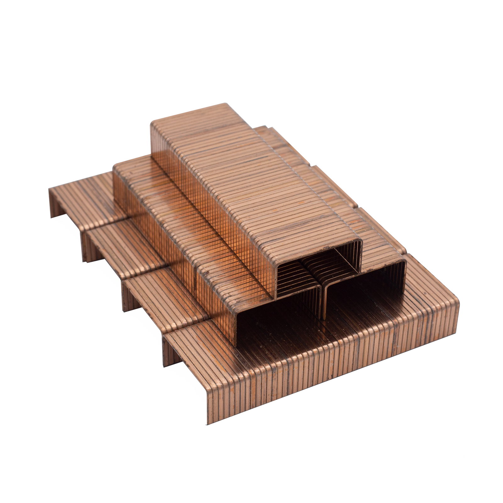various sticks of copper-colored industrial staples stacked up