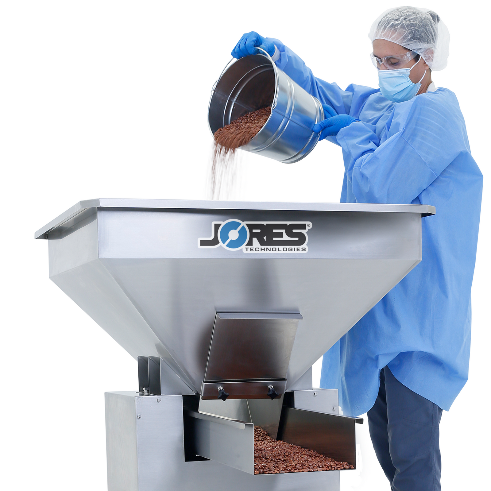 Worker pouring product into a vibratory feeder