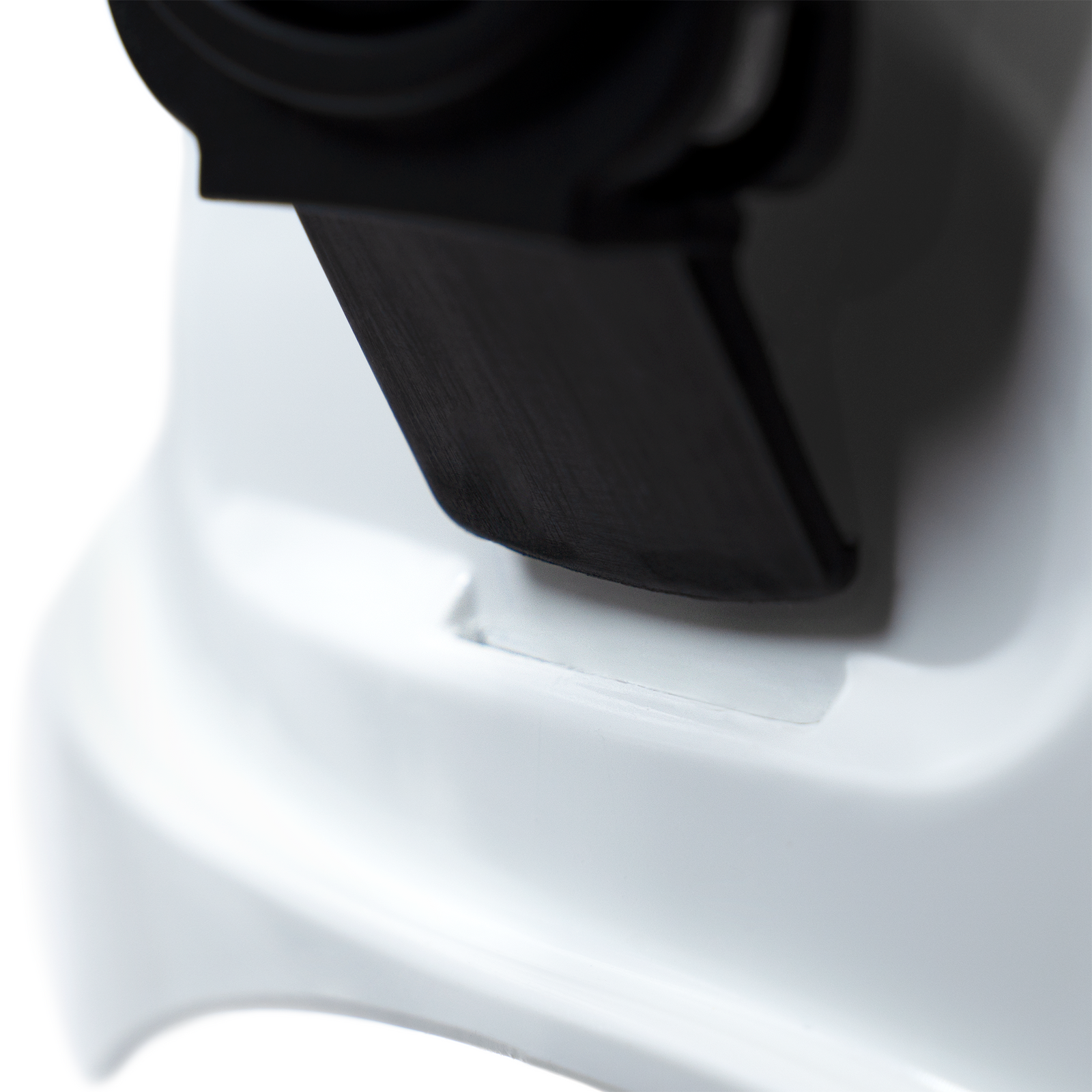 Close up detail shows the slotted had hat  and the mountable ear muff been installed