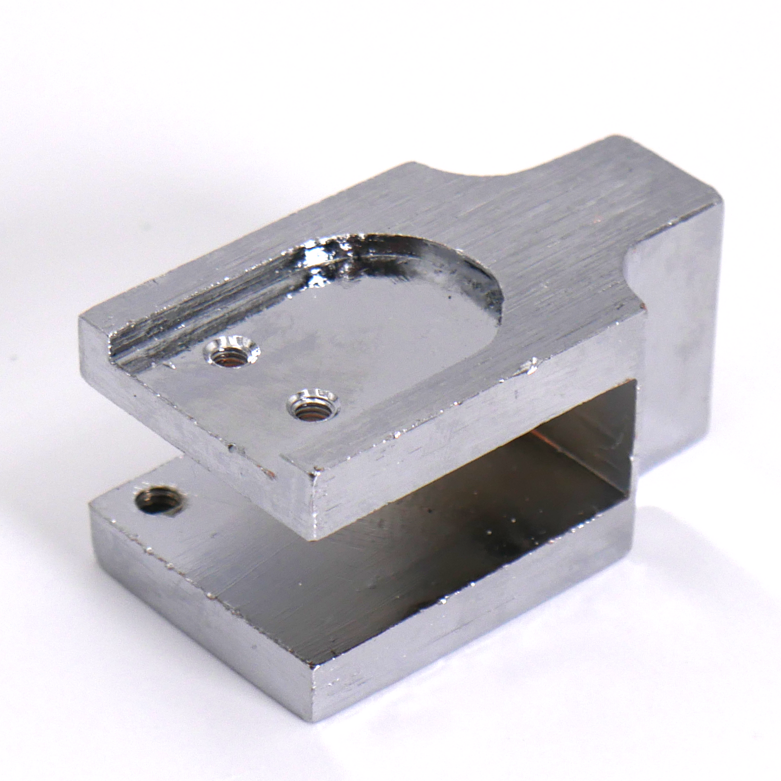 Metal cutting blade holder used in a JORES TECHNOLOGIES®  Impulse sealer with integrated cutter