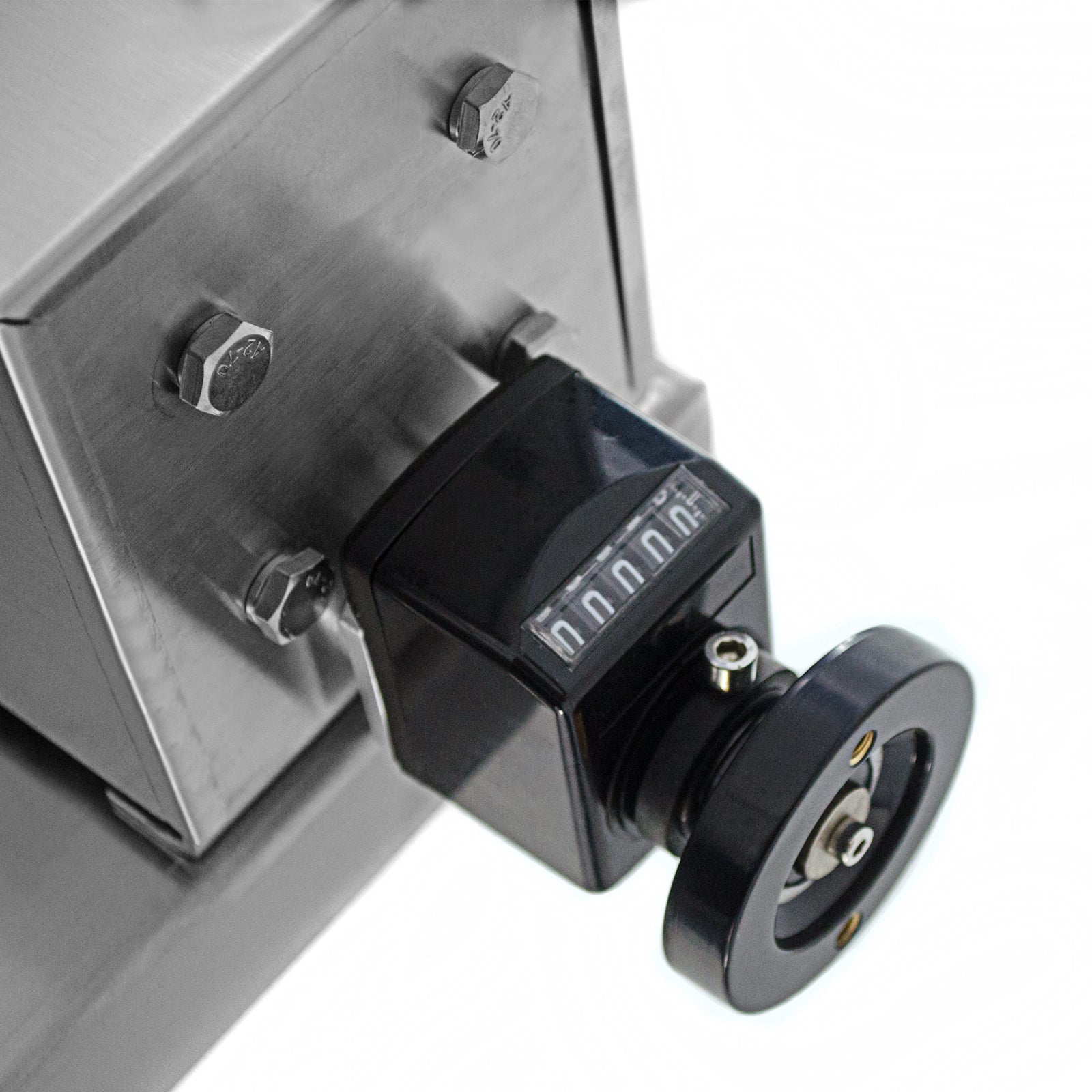 Close-up of the black hand-wheel that includes a liquid flow counter used for setting the dispensing quantity