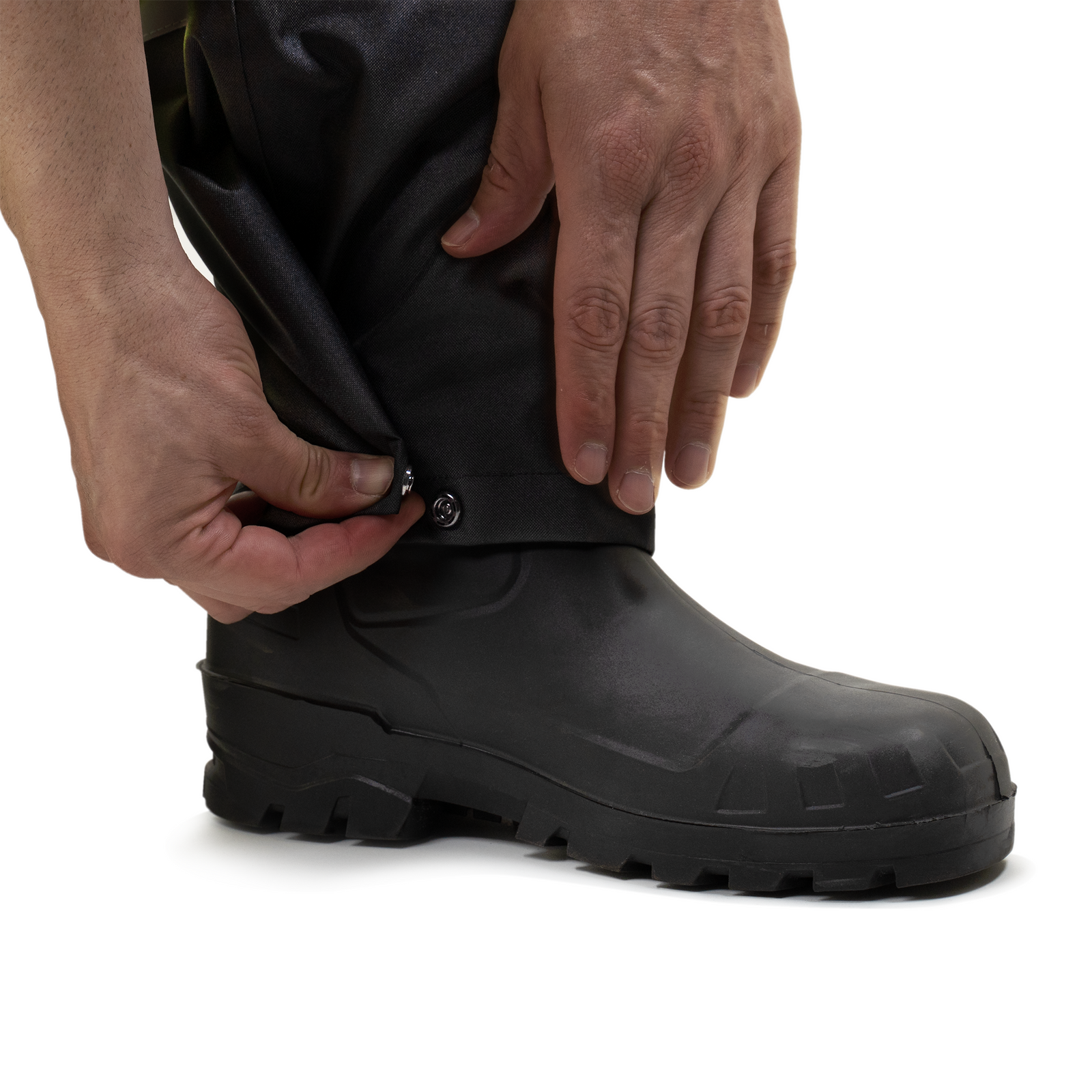 close up detail to show a person buttoning up the bottom of the pants for comfort and sizing 