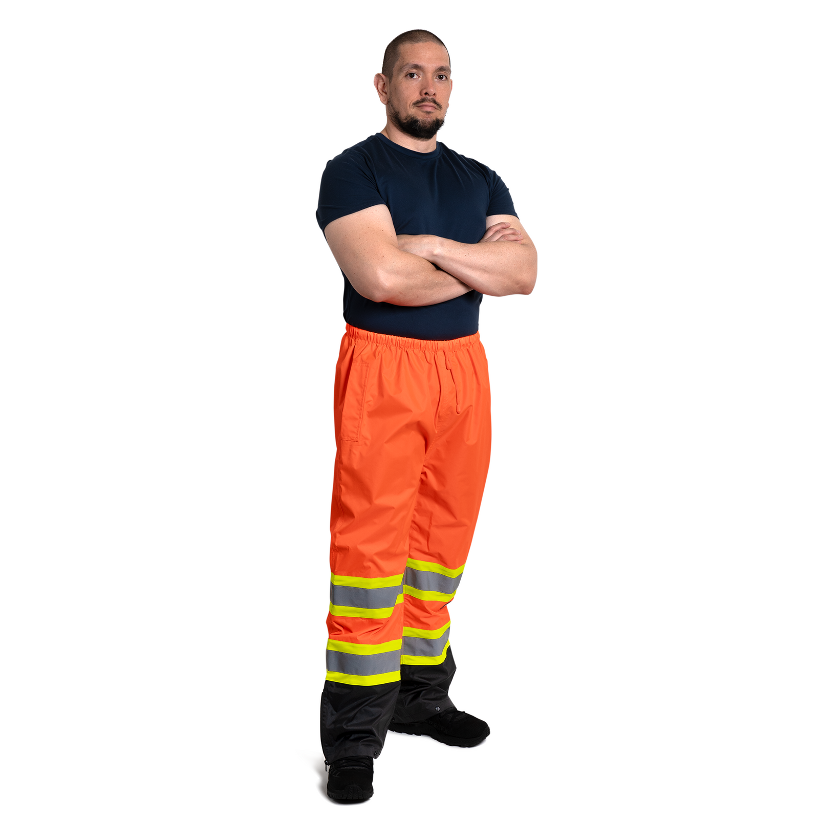 Man wearing the hi vis two tone safety rain pants with reflective and contracting stripes for road protection