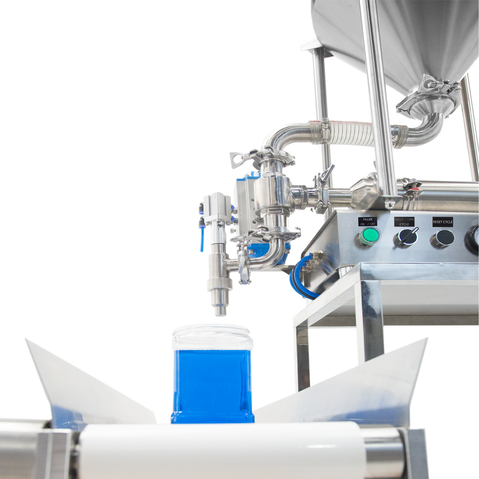 a side view of the tabletop piston filler showing the clear container after it has been filled with blue liquid