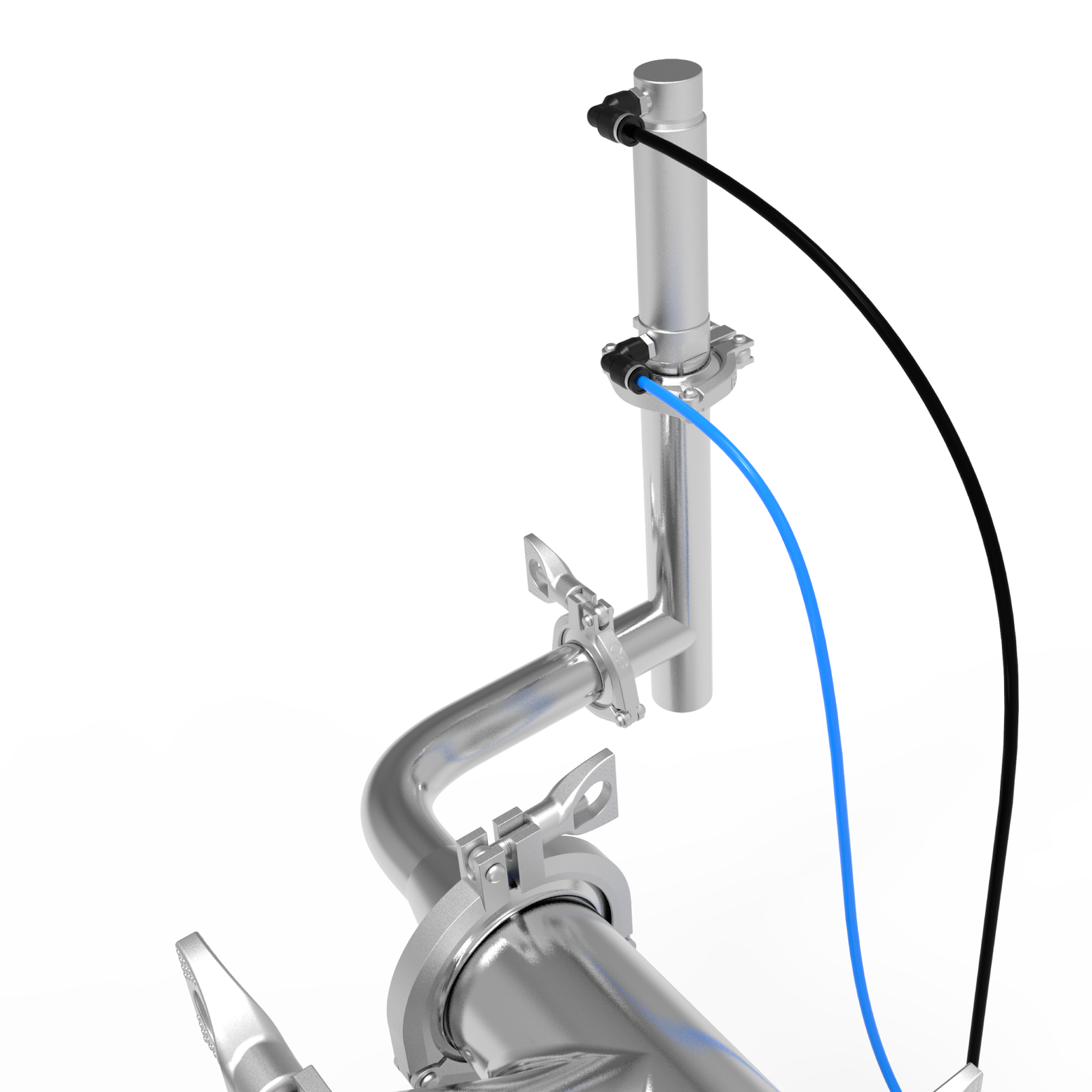 Closeup of the Non-drip liquid dispensing nozzle, compressed air hoses, and triclamp attachment for tool-less machine disassembly