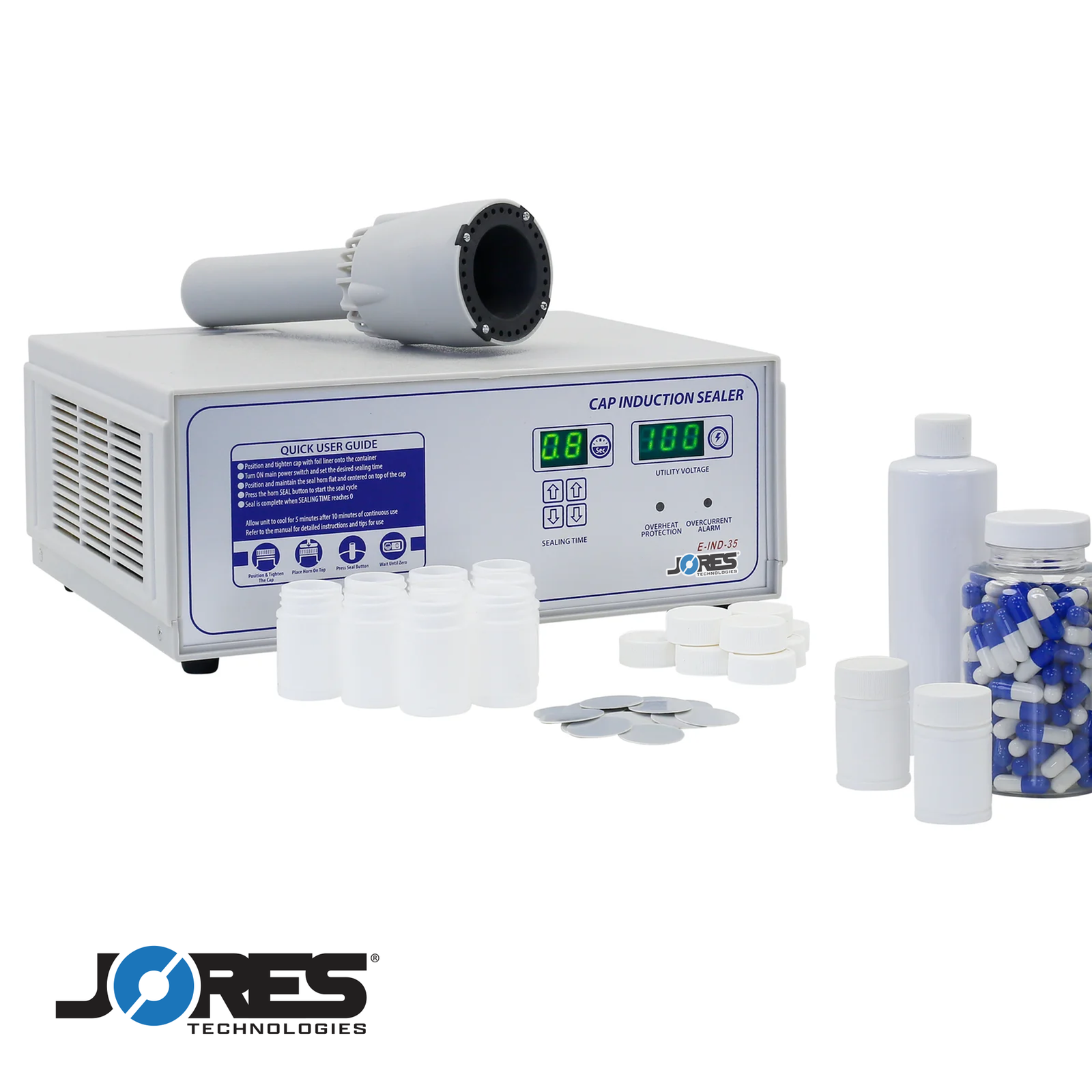 The JORESTECH induction cap sealer surrounded by a collection of different plastic containers and induction liners places on top of a work table