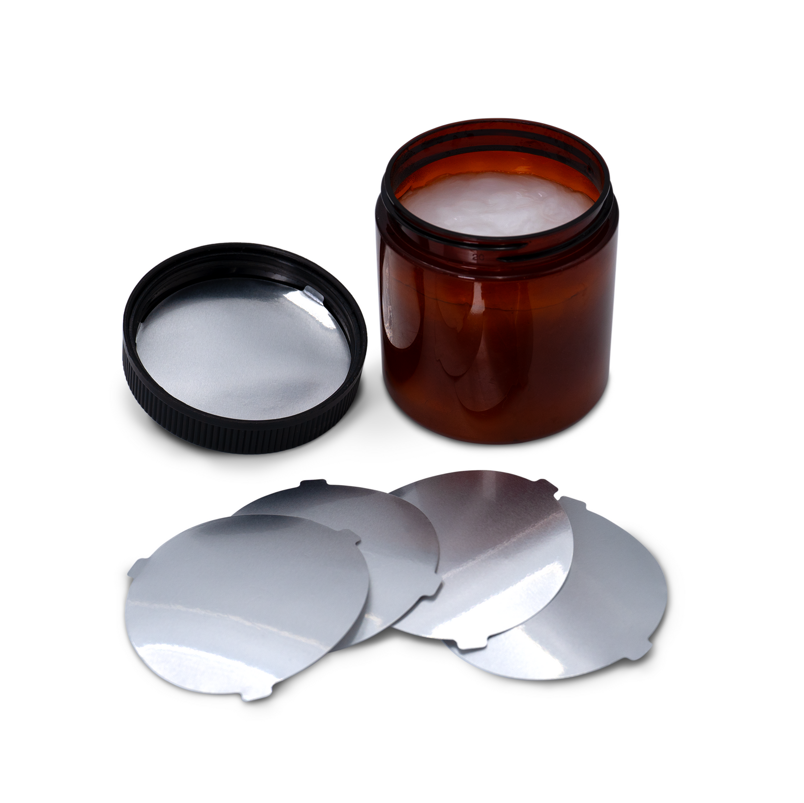 Position of the induction liner with tabs inside the cap before been sealed 