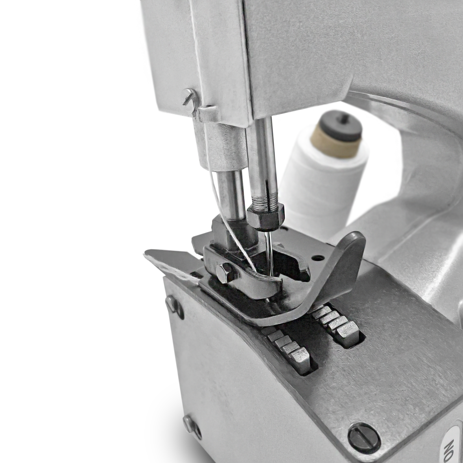 close up of sewing needle on portable electric bag sewing machine