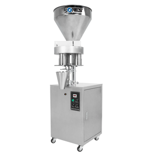 Stainless steel JORES TECHNOLOGIES® semi automatic volumetric filler for free-flowing granular products for 1000 ml in a diagonal view over white background