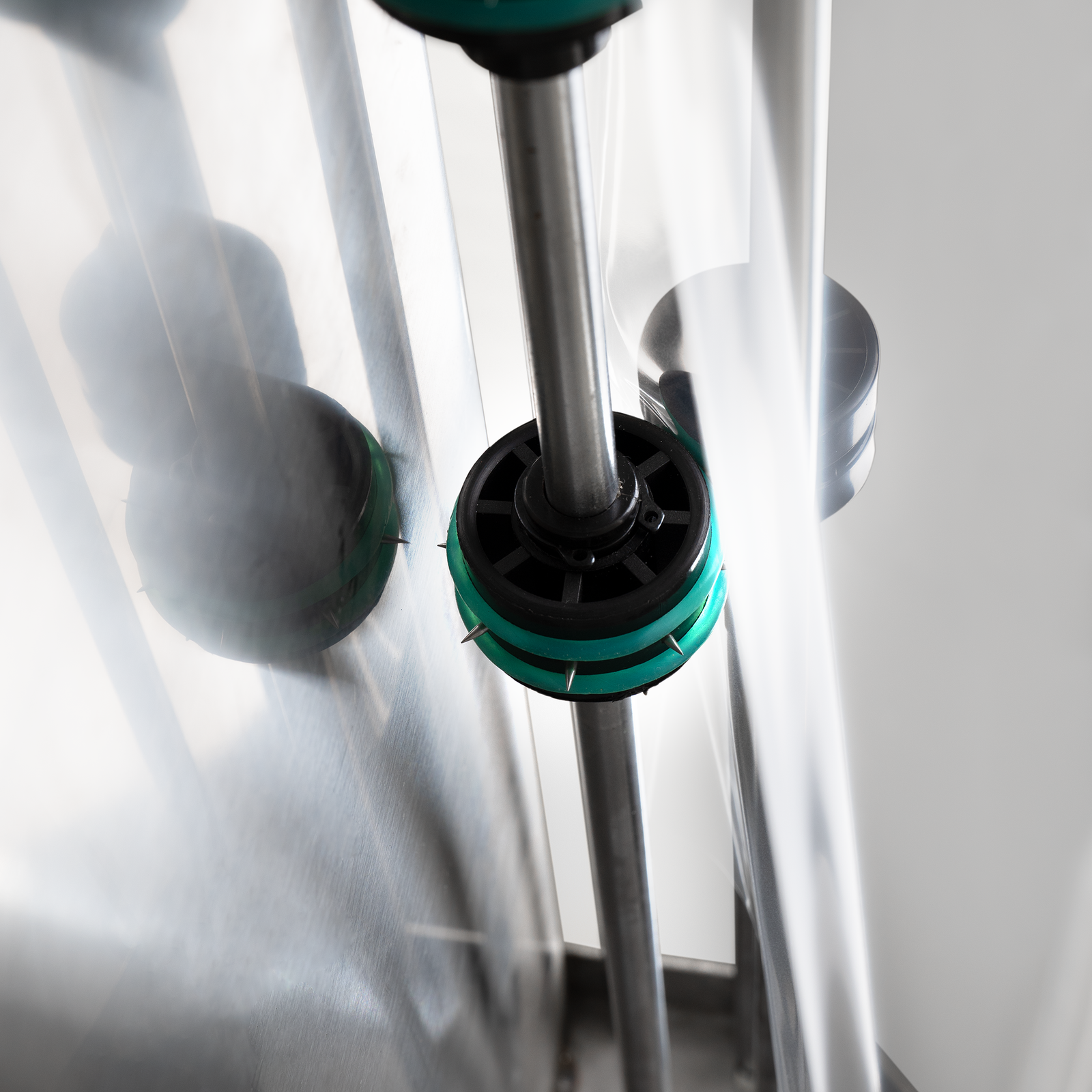 Devise to puncture and hold film in place on a JORES TECHNOLOGIES® L bar film sealer.