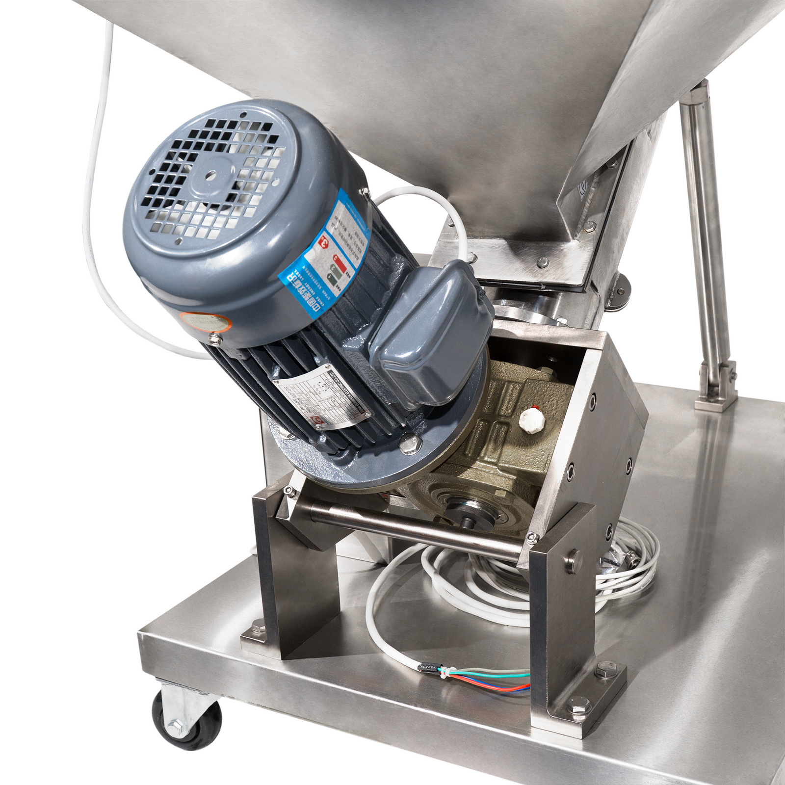 Cose-up of the motor of the automatic auger screw elevator for powders with agitator