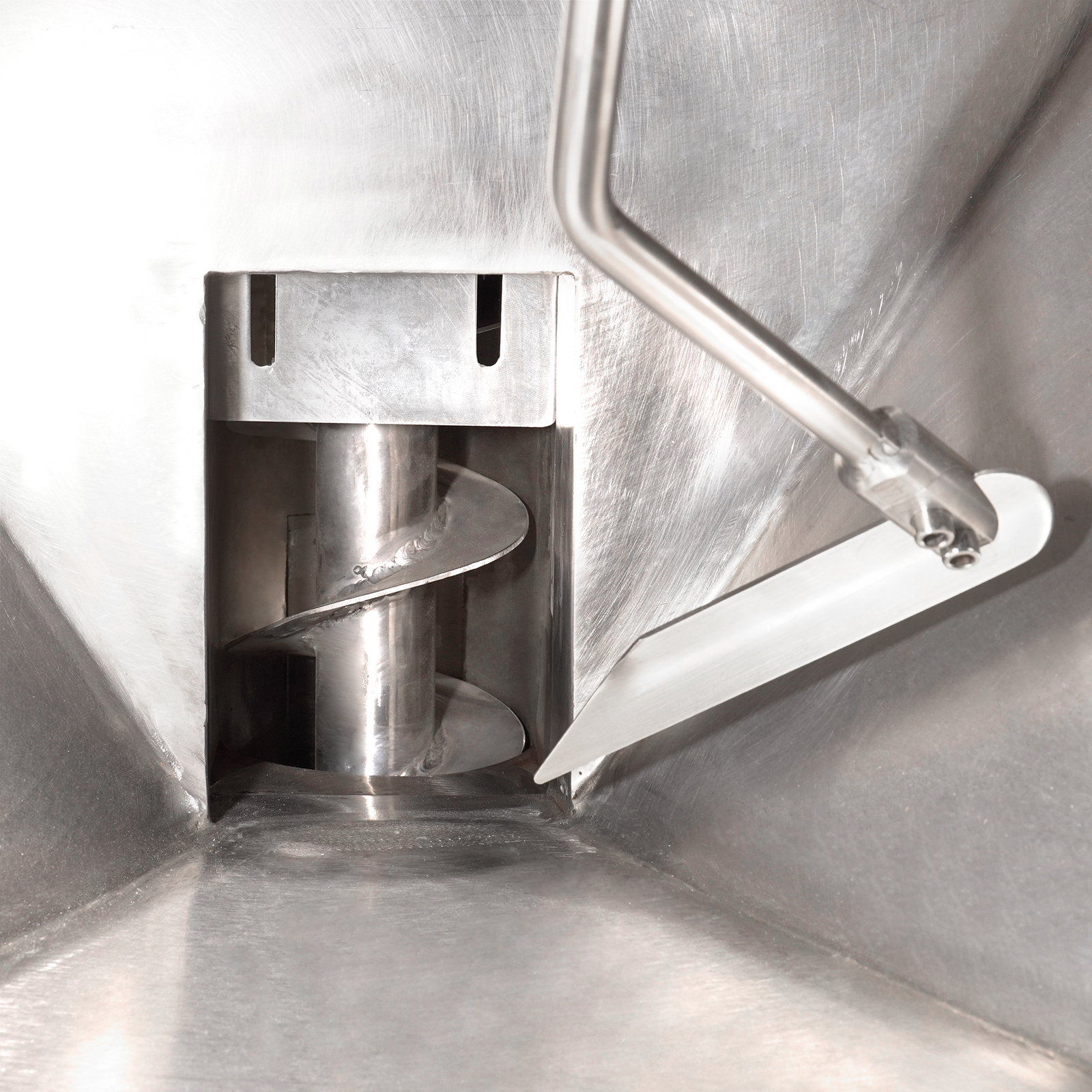 Close up of the screw  and the agitator on the JORES TECHNOLOGIES® automatic auger filler for powders