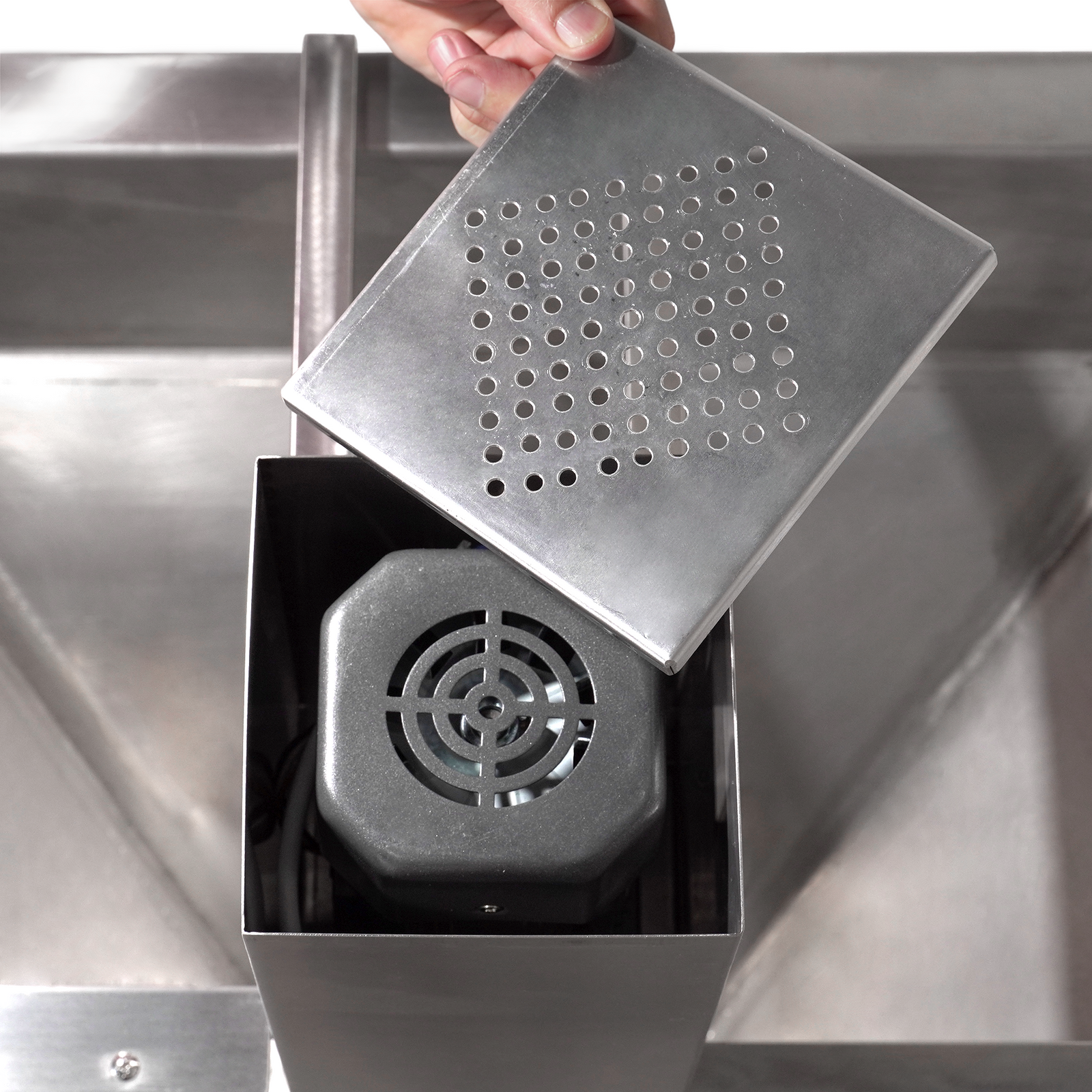 Close-up of the motor of the agitator on the auger screw elevator for powders