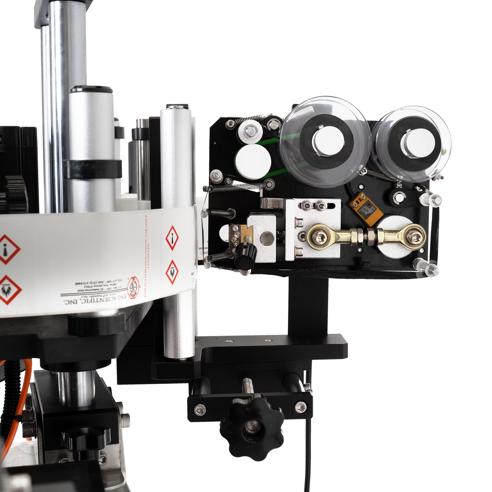 label applicator system with integrated hot stamp coder for round bottles