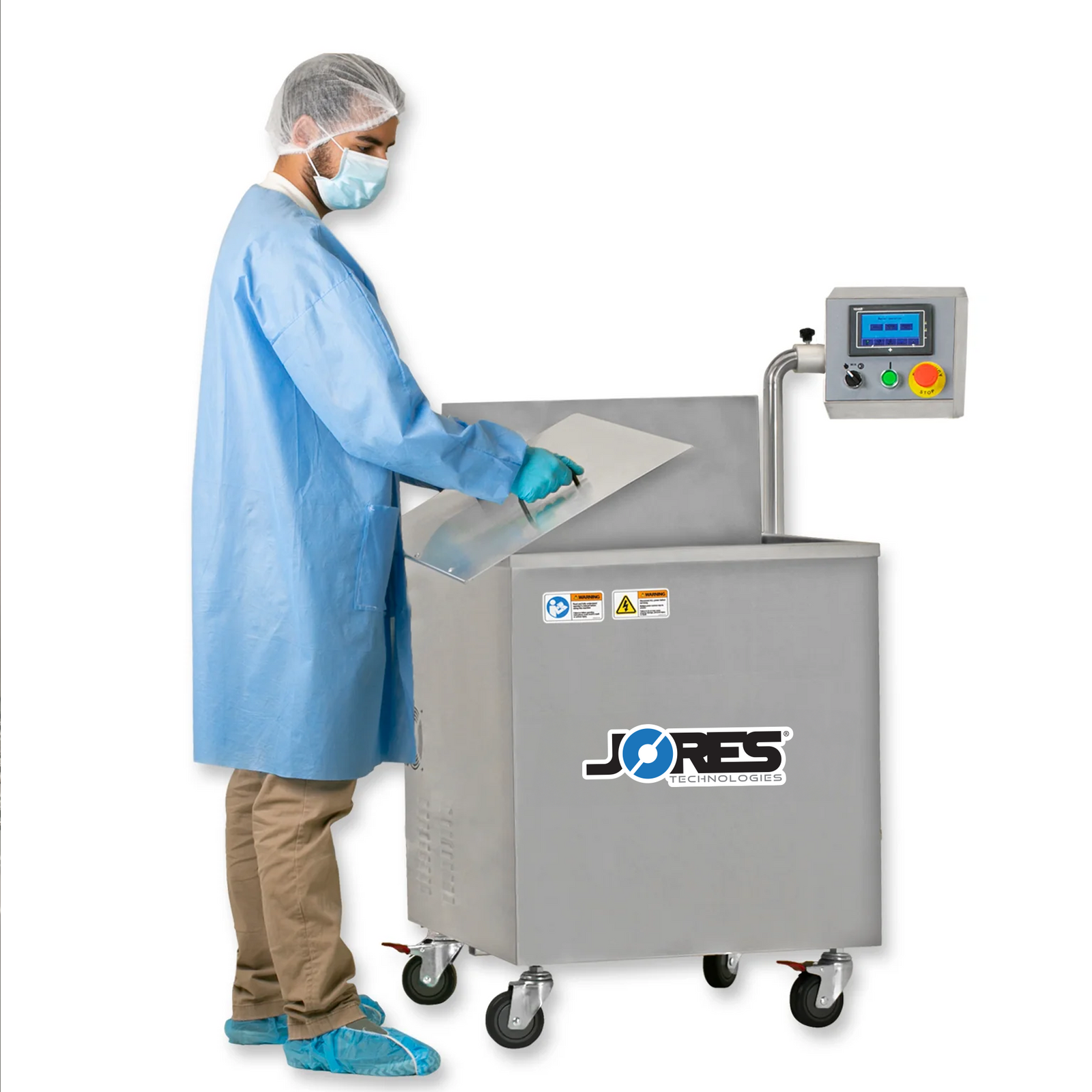 Person removing the lid that covers the JORES TECHNOLOGIES® semi-automatic dip style hot water shrink tank