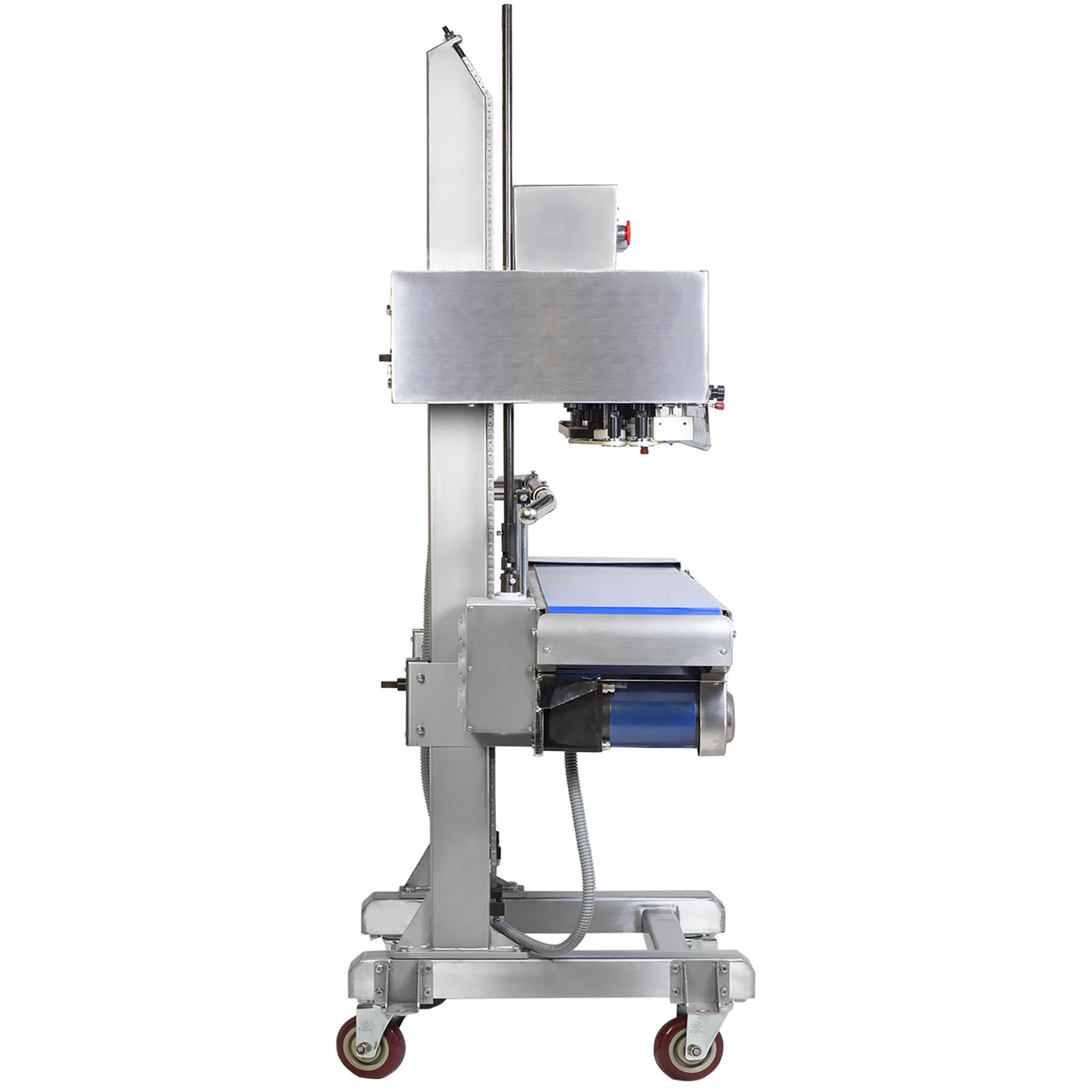 Side view of the  JORESTECH stainless steel continuous band sealer with green revolving band and heavy duty wheels over white background. Also show the side where the bag is coded and the end of the sealing process