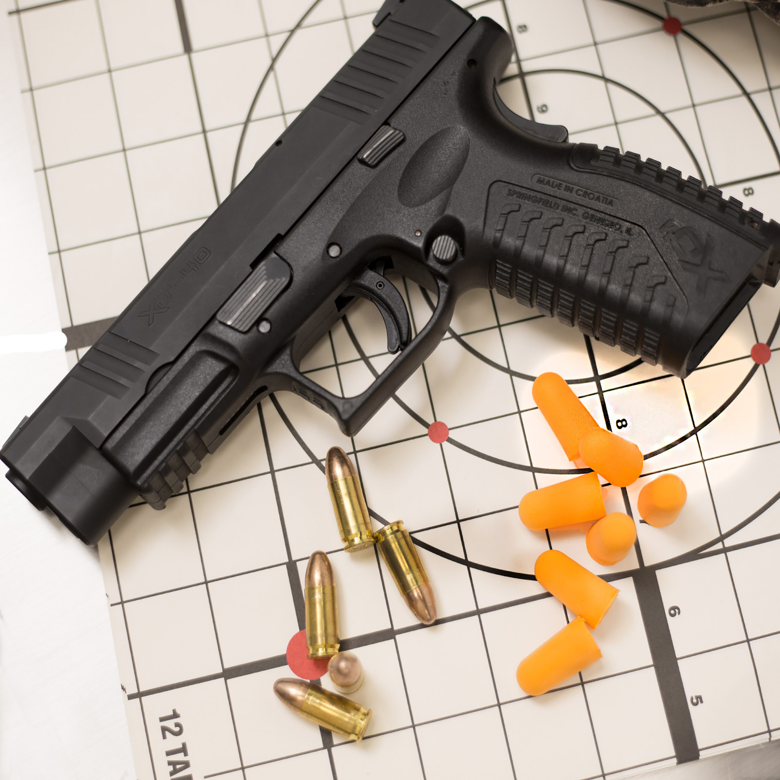 ear plugs being used for hearing protection in a shooting range