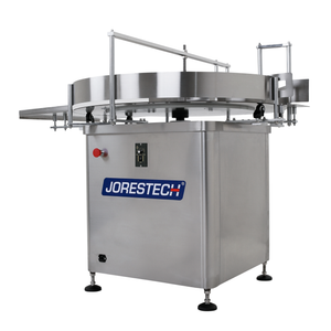 Diagonal view of the Stainless steel 39 inch JORESTECH rotary accumulation table and bottle unscrambler