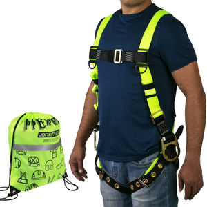 Front view of the torso of a person wearing the hi-vis yellow and black 3D fall protection safety body JORESTECH harness with grommets. Also shows of the hi-vis string bag that comes included with the harness
