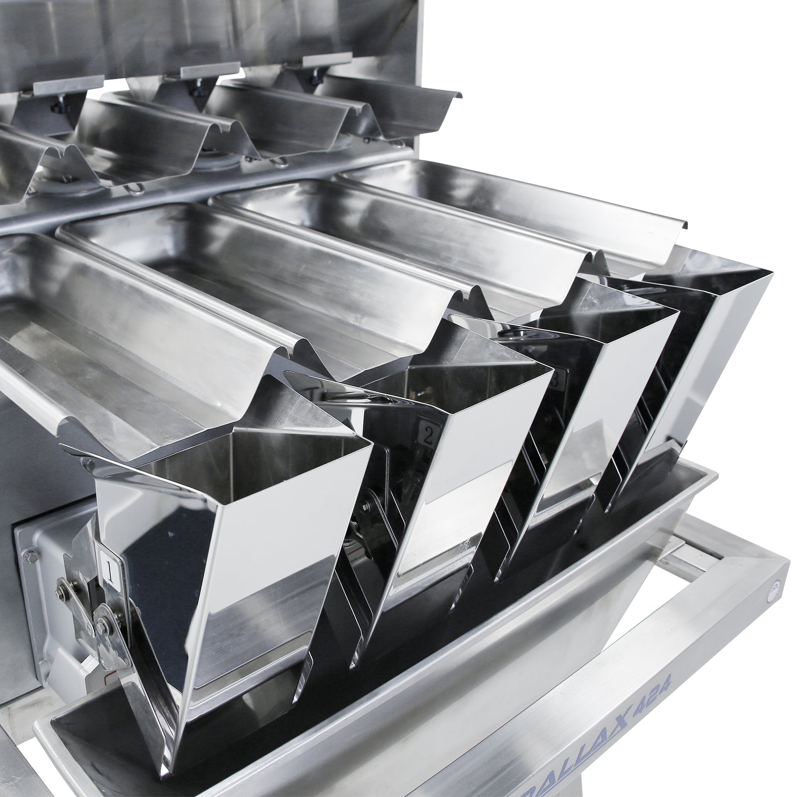 closeup of the vibratory trays of the JORES TECHNOLOGIES® stainless steel 4 head linear weigher