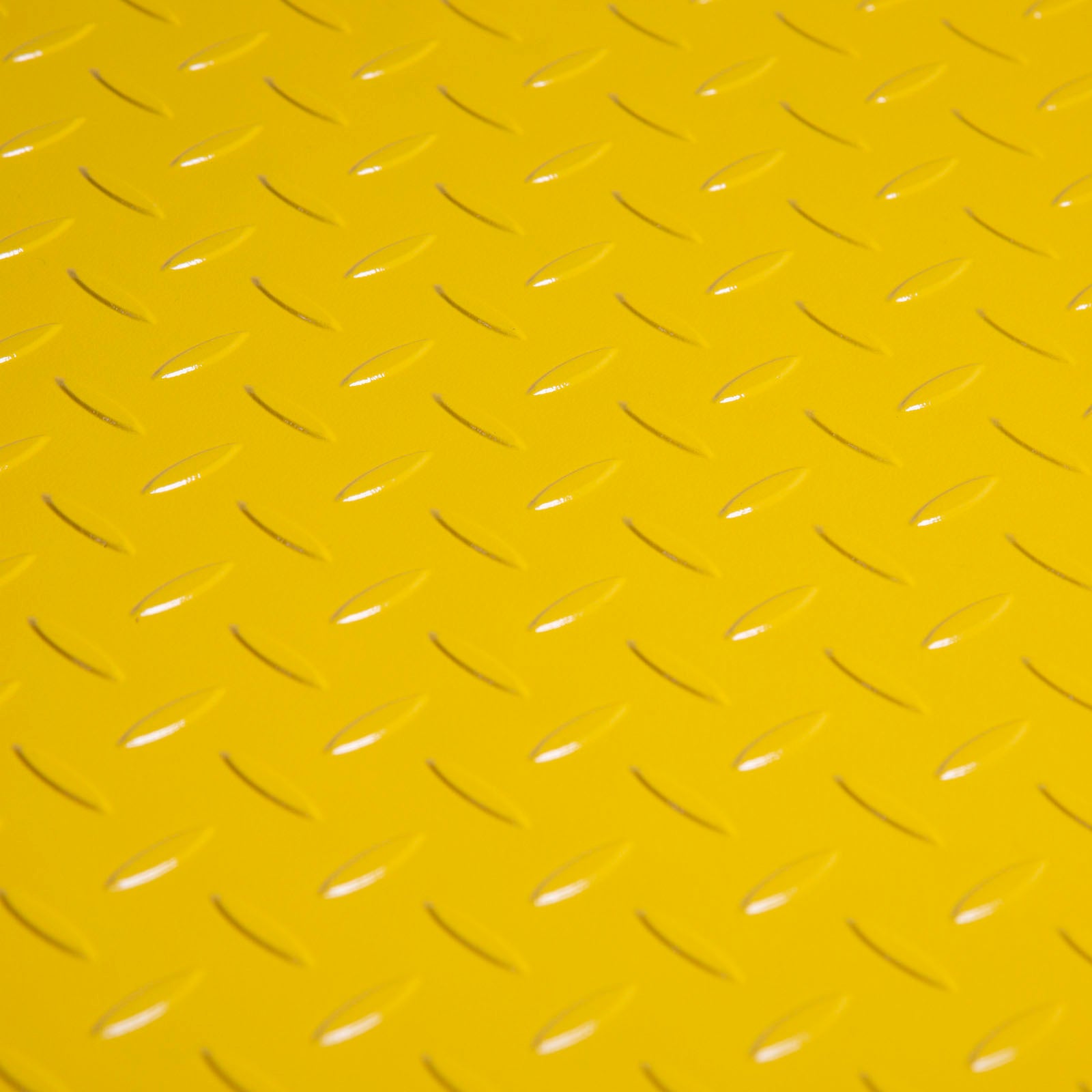  Detailed shot of the anti-slip embossed texture on the surface of the Stretch Wrapper's loading ramp.