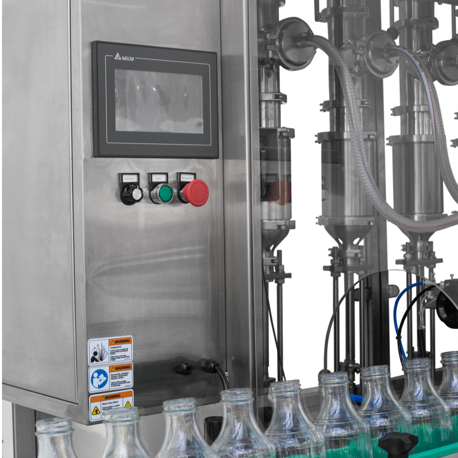 Closeup of the jorestech 6 head inline piston filling system's control panel and a group of round clear glass bottles positioned on the conveyor 