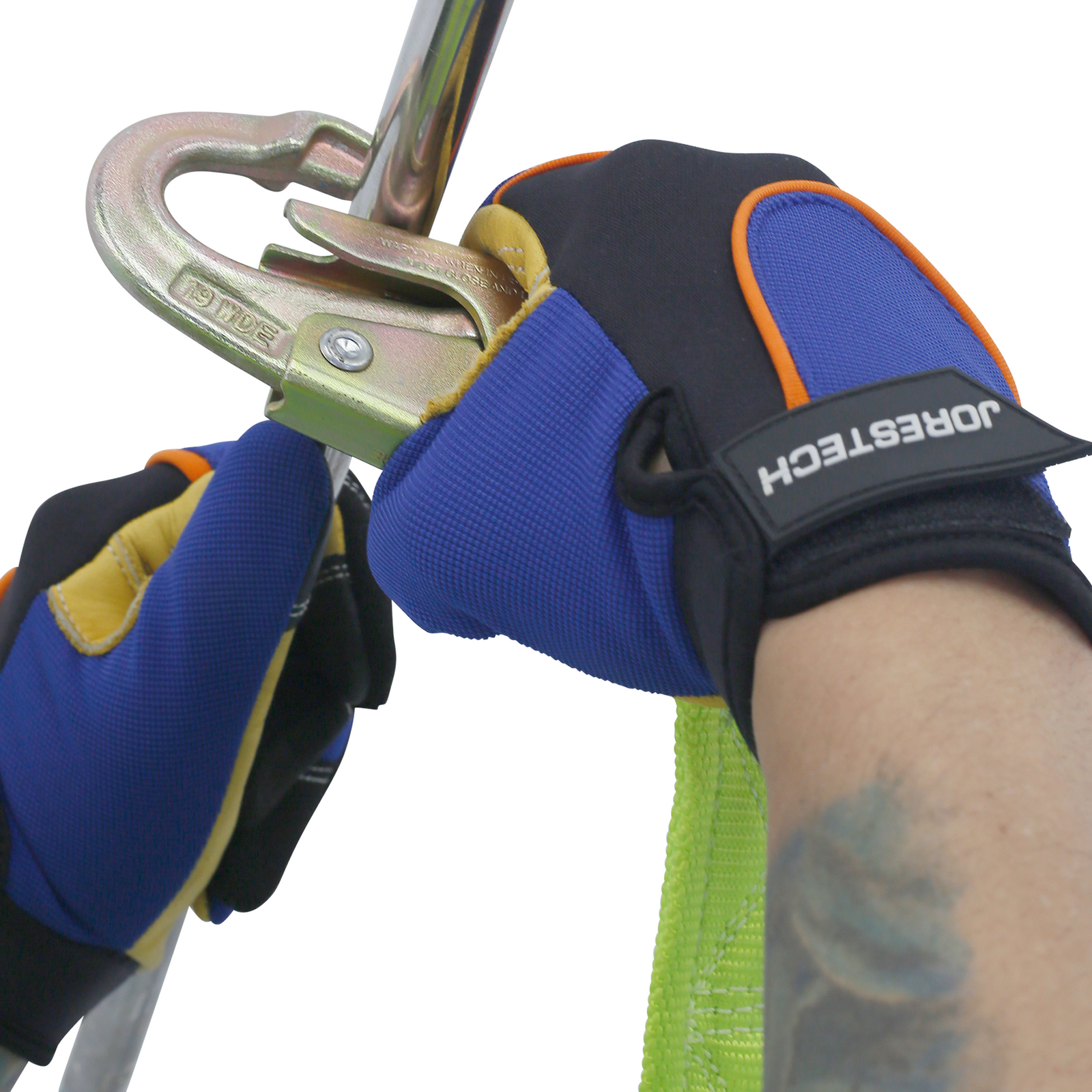 Close up of the hands of a worker inserting the snap hook into a metal structure to secure himself. with the work positioning lanyard with self looking snap