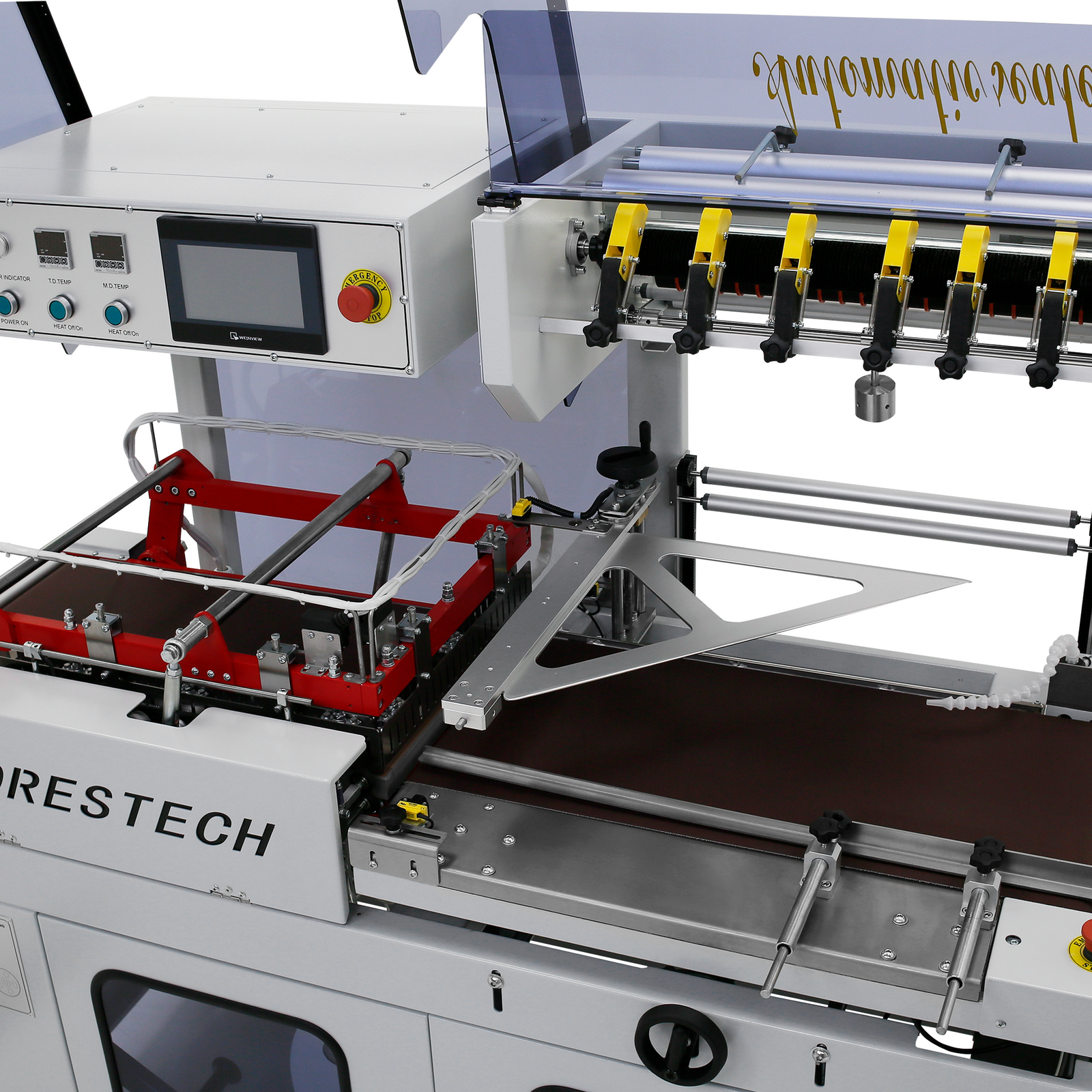 Close up shows the sealing element, the motorized conveyor belt and the digital control panel of the light gray JORES TECHNOLOGIES® automatic L Bar Heat Film Sealer 
