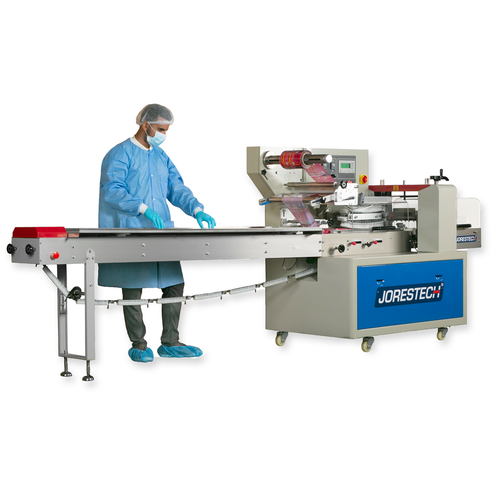 Operator dressed in a blue full PPE suit is seen placing products on the chain conveyor of a horizontal flow wrapping machine