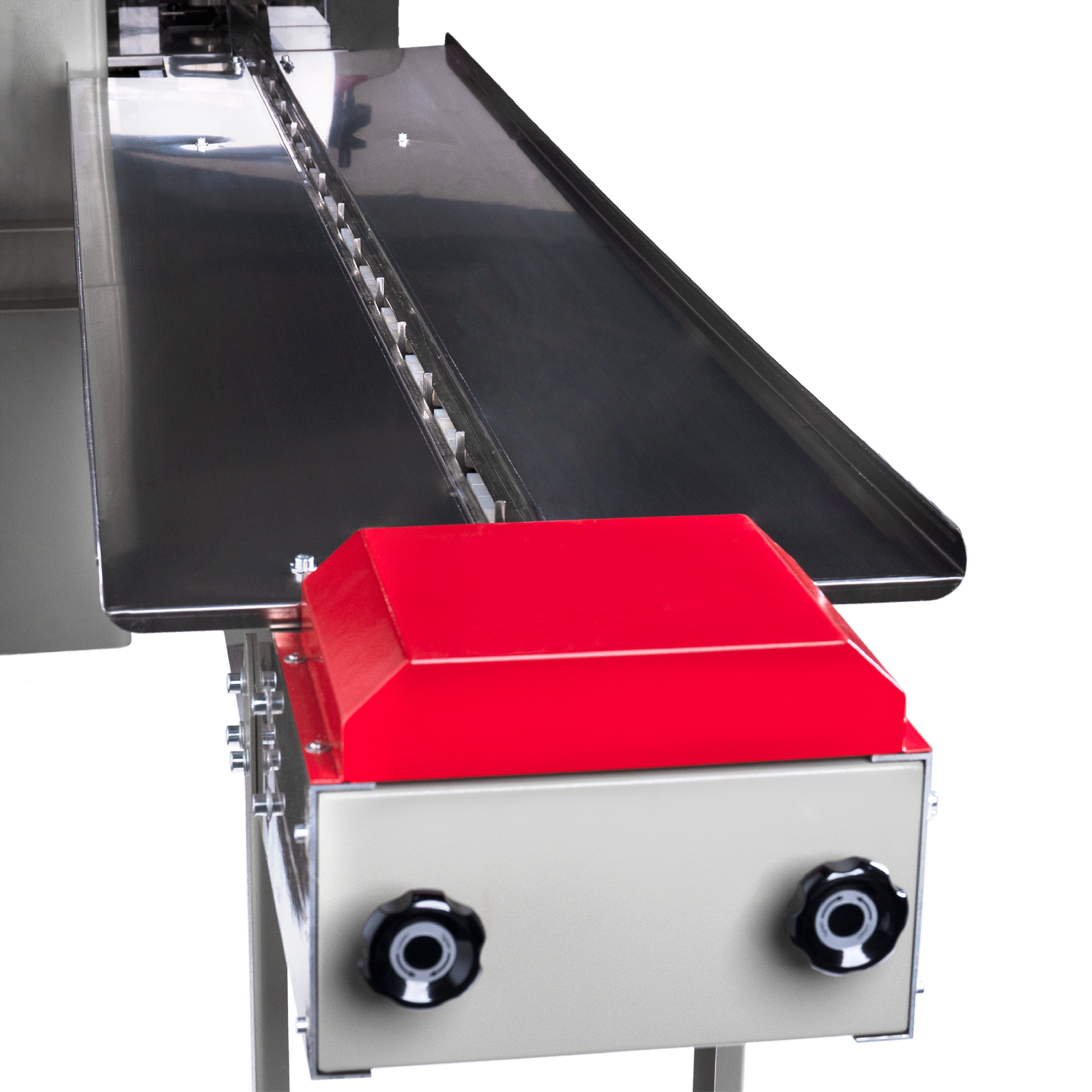 Close up showing 2 handles for adjusting the tension of the conveyor chains on an automatic horizontal flow wrapper with inverted film feeder