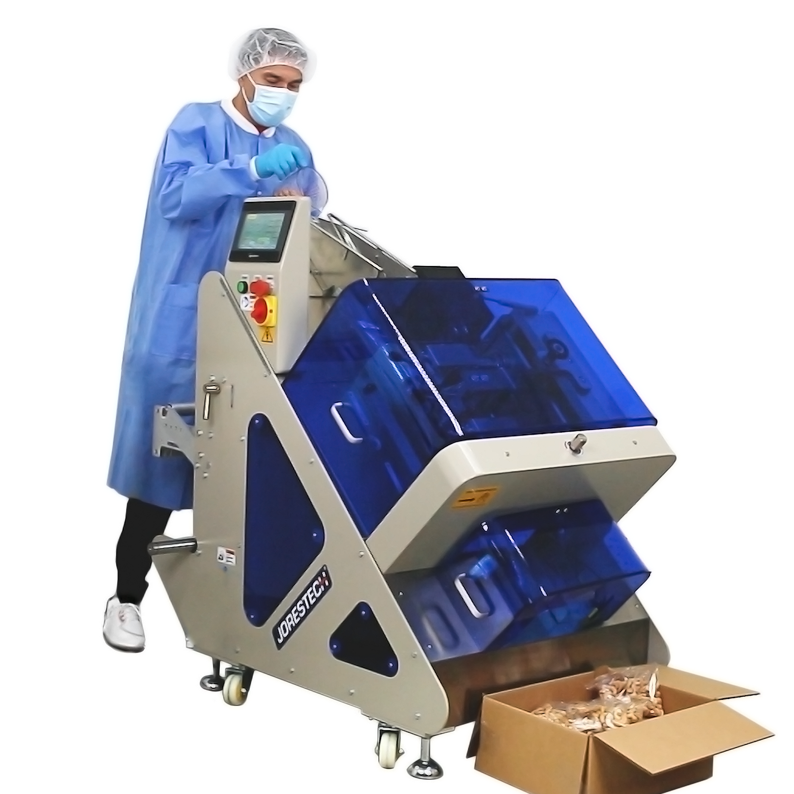 A person wearing protective disposable clothing while dispensing cashues into the Automatic-inclined-JORESTECH flow-wrapper. There is a brown card box on the floor with product packed in individual bags exiting the wrapper