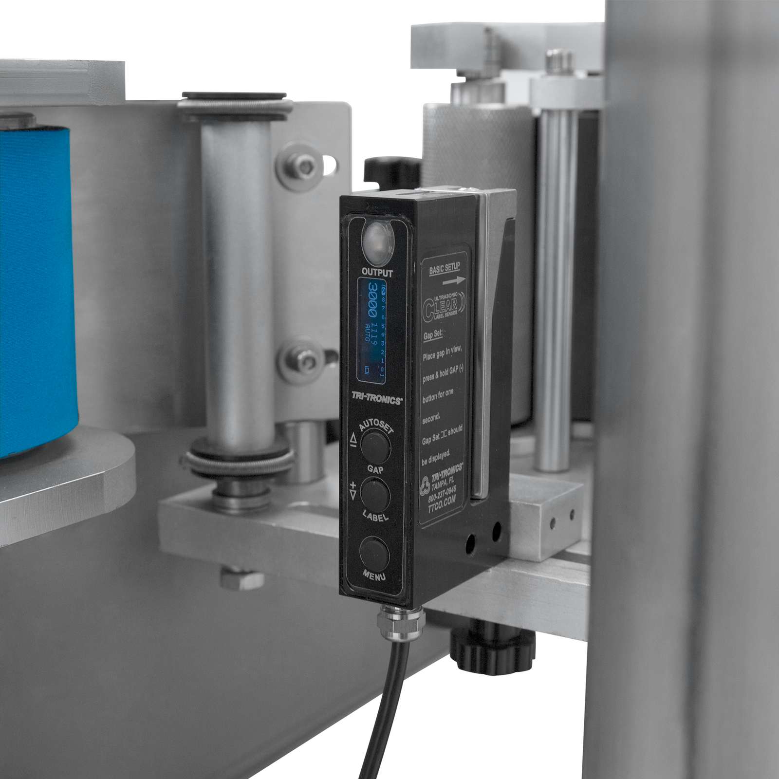 close up of speed adjusting module on of stainless steel automatic label applicator