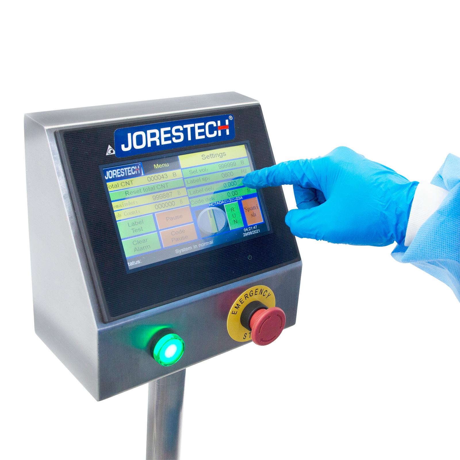 operator using digital touchscreen with green light on and red emergency stop button on stainless steel automatic label applicator for small round containers 