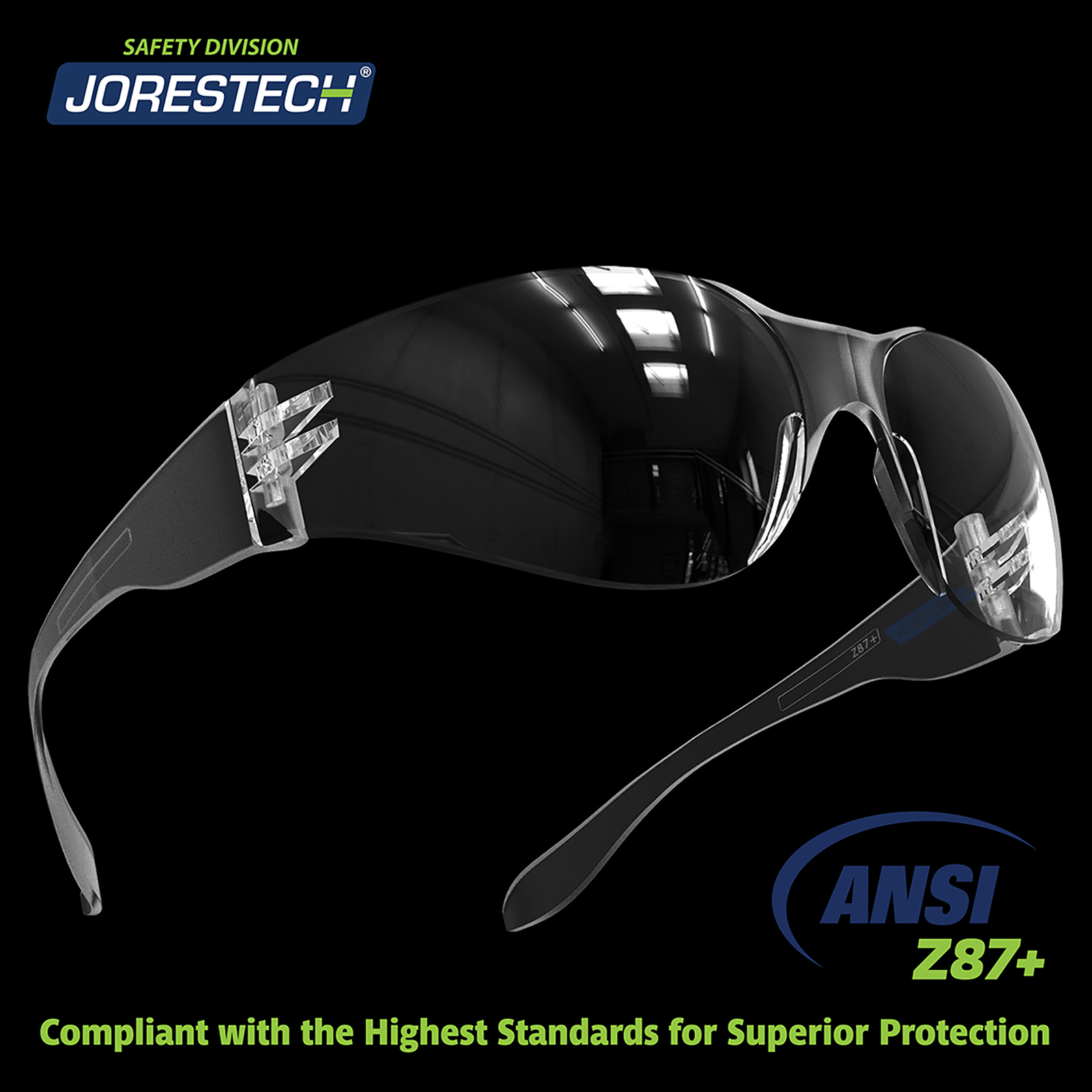 One JORESTECH anti-fog clear safety glasses for high impact protection over black background. Bright green and blue letters read: ANSI Z87+ Compliant with the highest standards for superior protection.