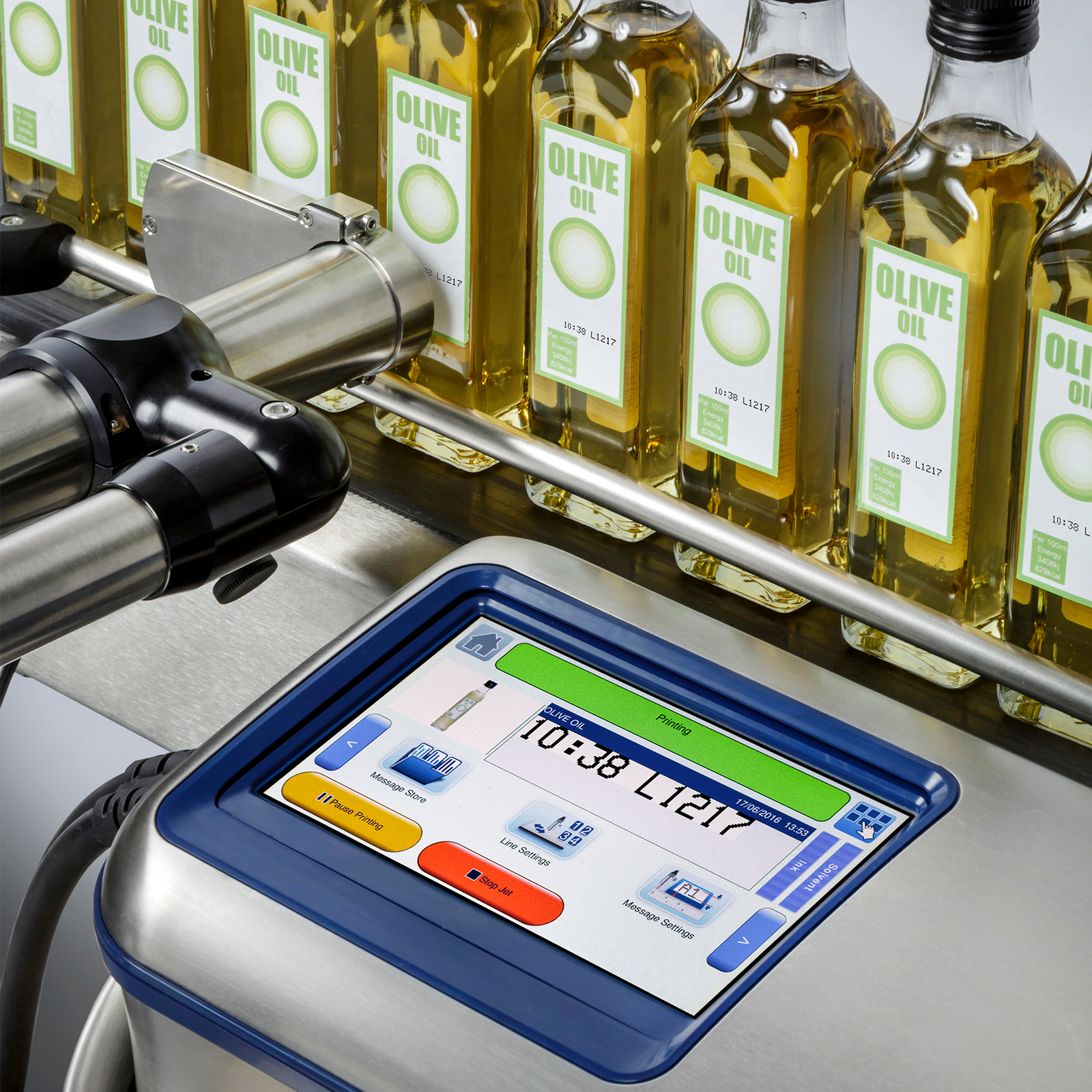 Inkjet coder installed as part of a production line of olive oil glass bottles. Bottles are passing in front of the print head of the CIJ automatic inkjet coder LINX 10
