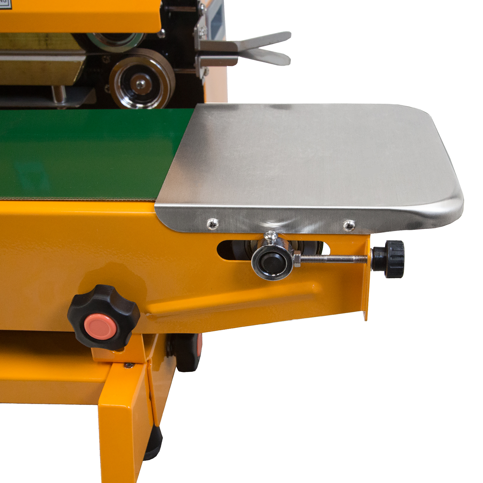 close up view of stainless steel base and the revolving band on JORES TECHNOLOGIES® continuous band sealer